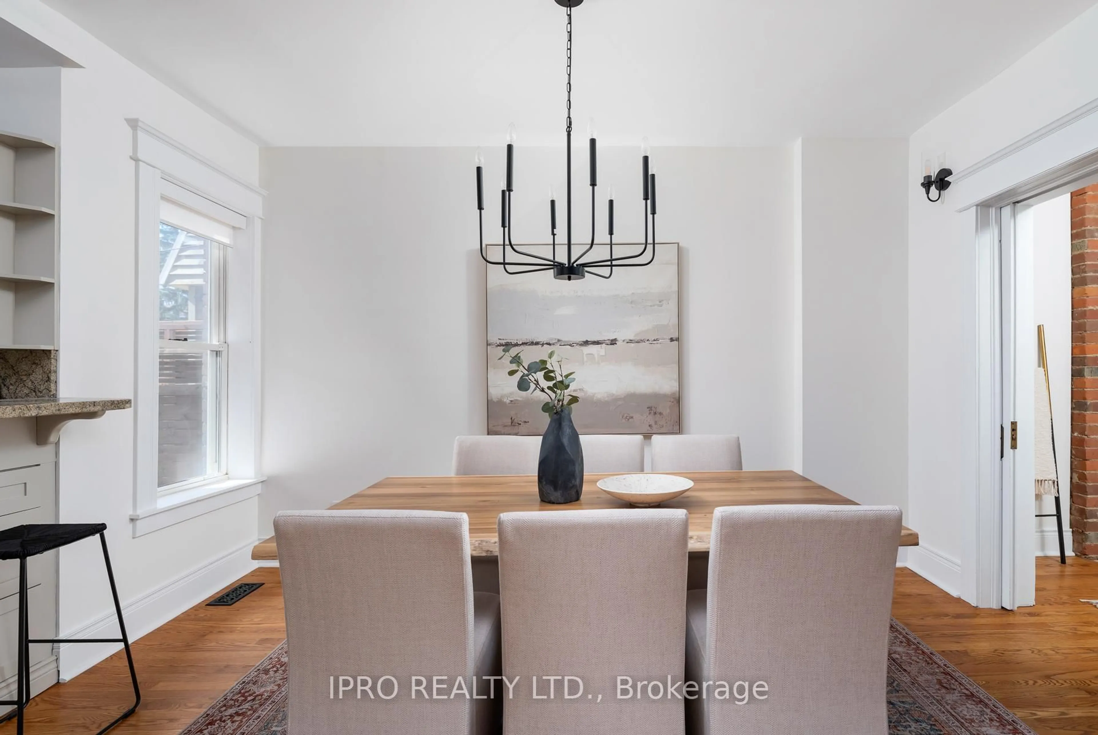Dining room, wood/laminate floor for 768 Logan Ave, Toronto Ontario M4K 3C8