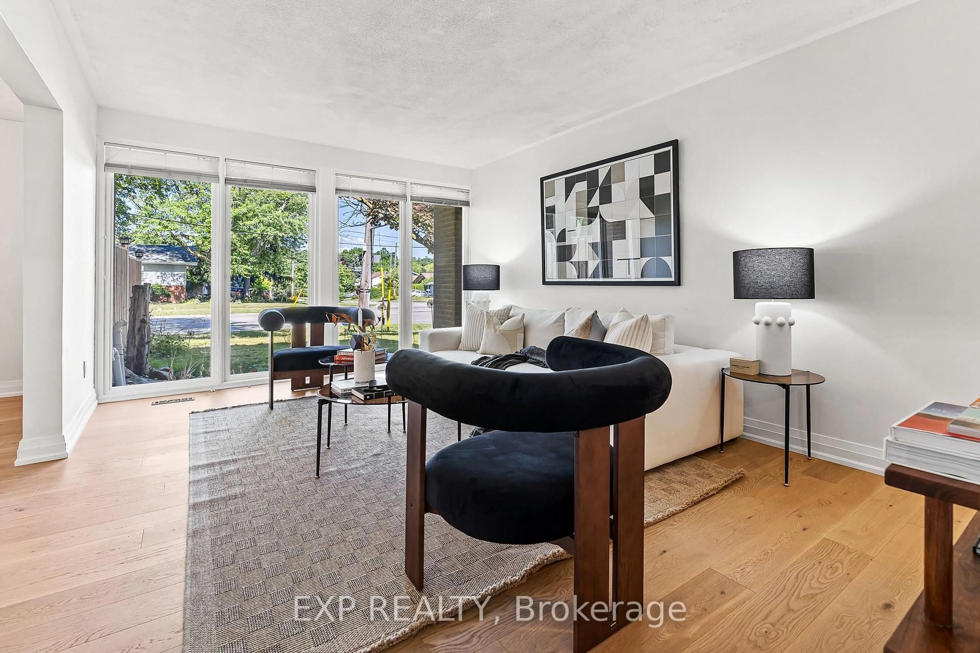 Living room with furniture, wood/laminate floor for 126 Slan Ave, Toronto Ontario M1G 3B9