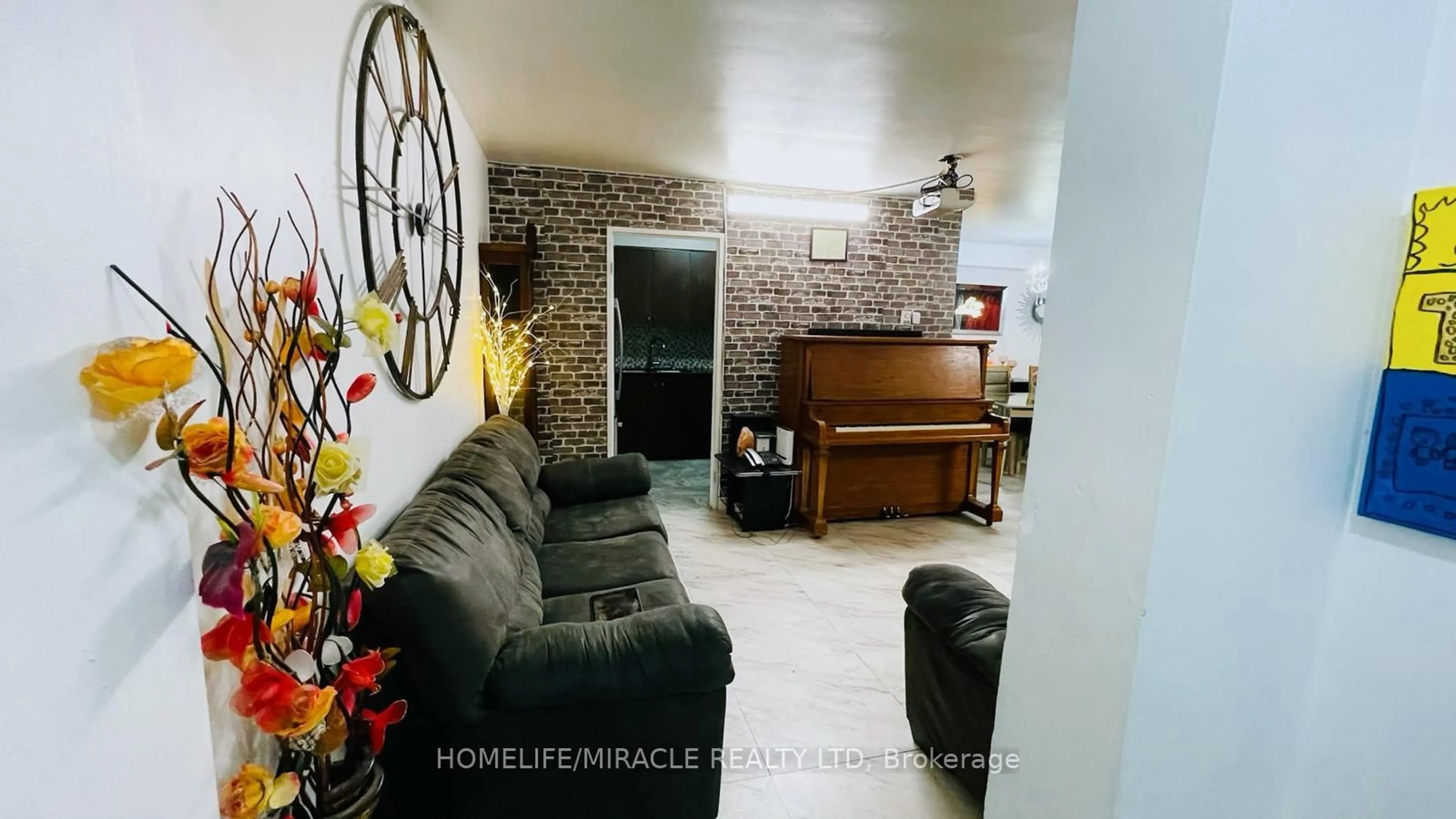 Living room with furniture, unknown for 5 Massey Sq #1108, Toronto Ontario M4C 5L6