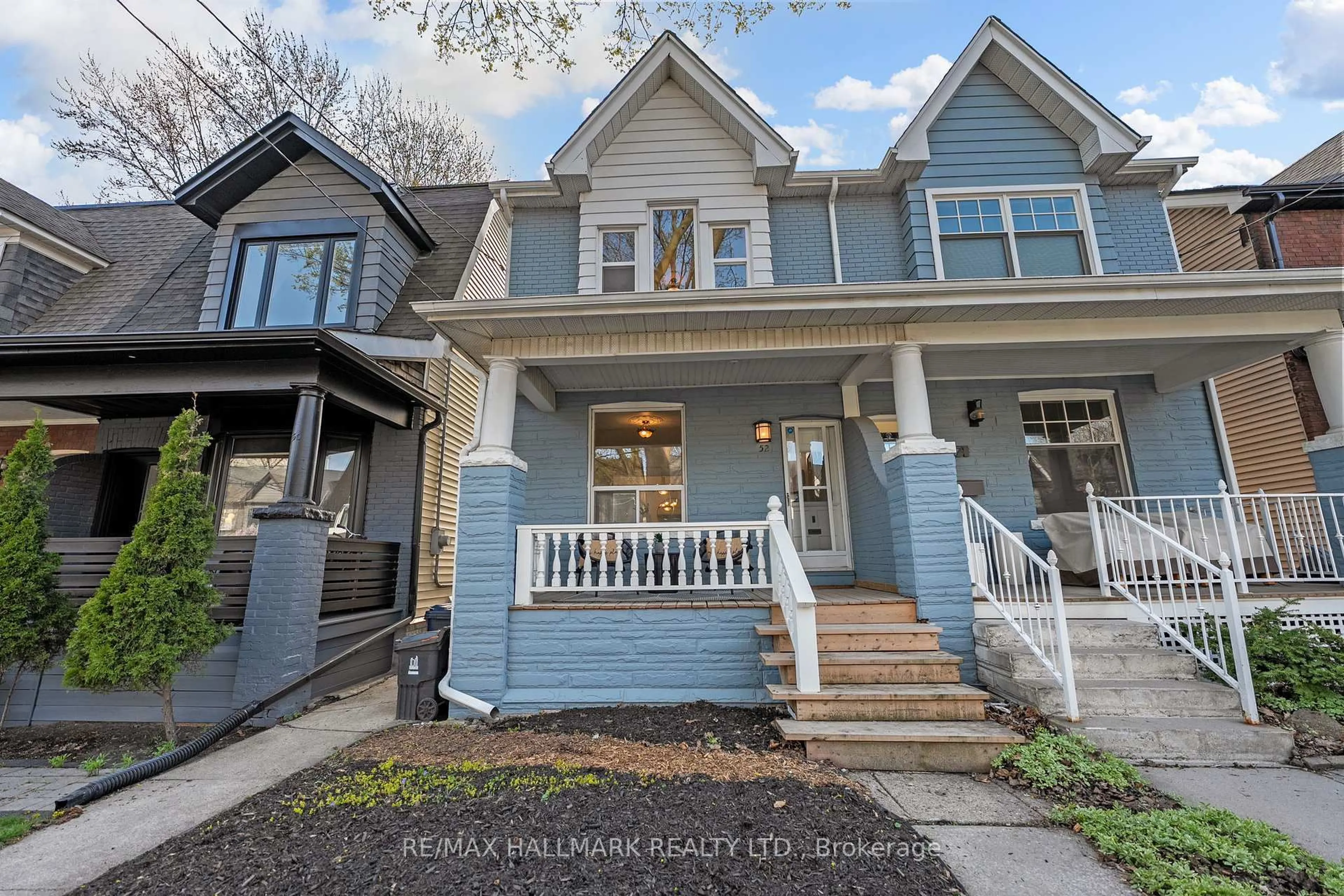 Home with vinyl exterior material, street for 52 Empire Ave, Toronto Ontario M4M 2L4