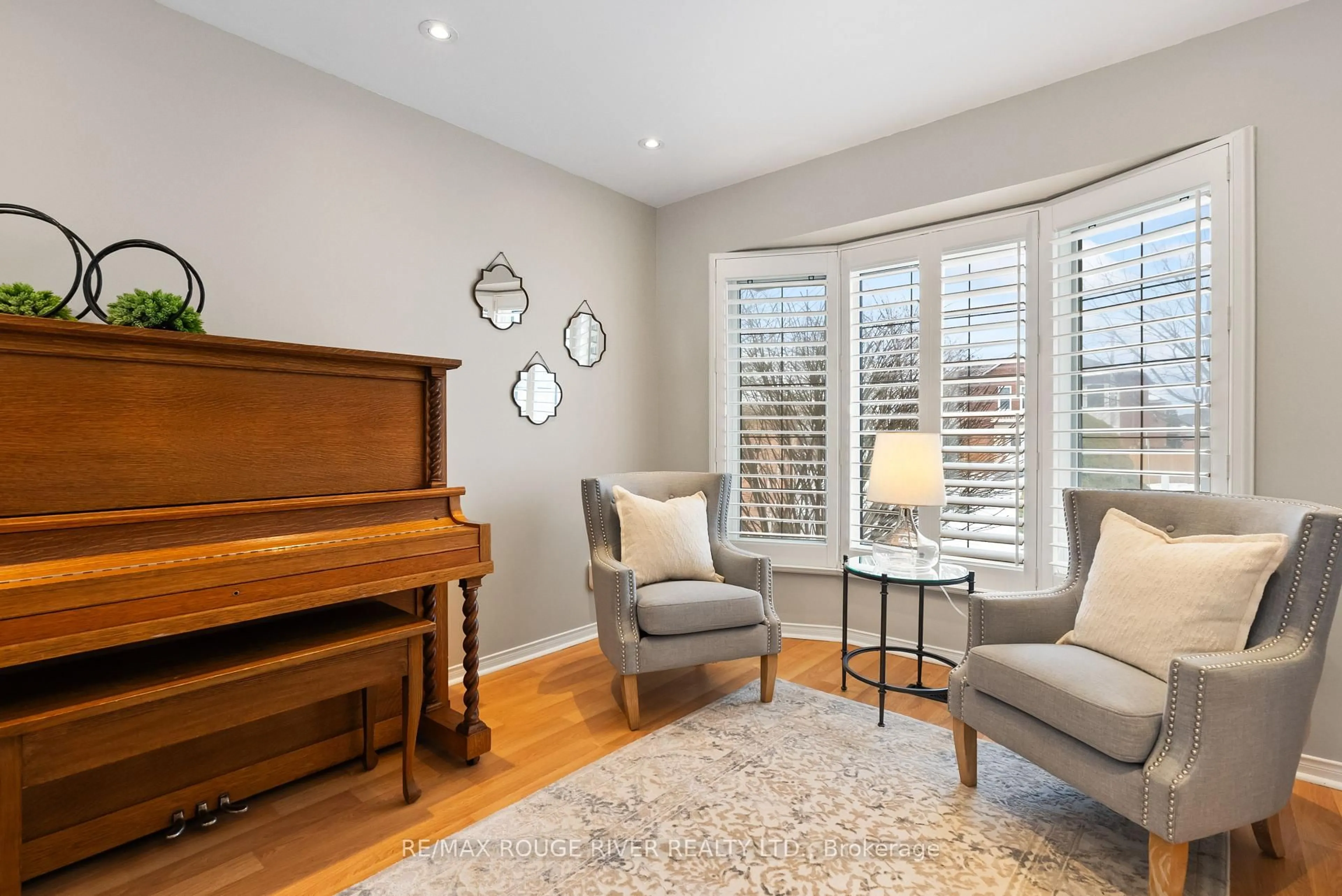 Living room with furniture, wood/laminate floor for 30 Willowbrook Dr, Whitby Ontario L1R 1S7