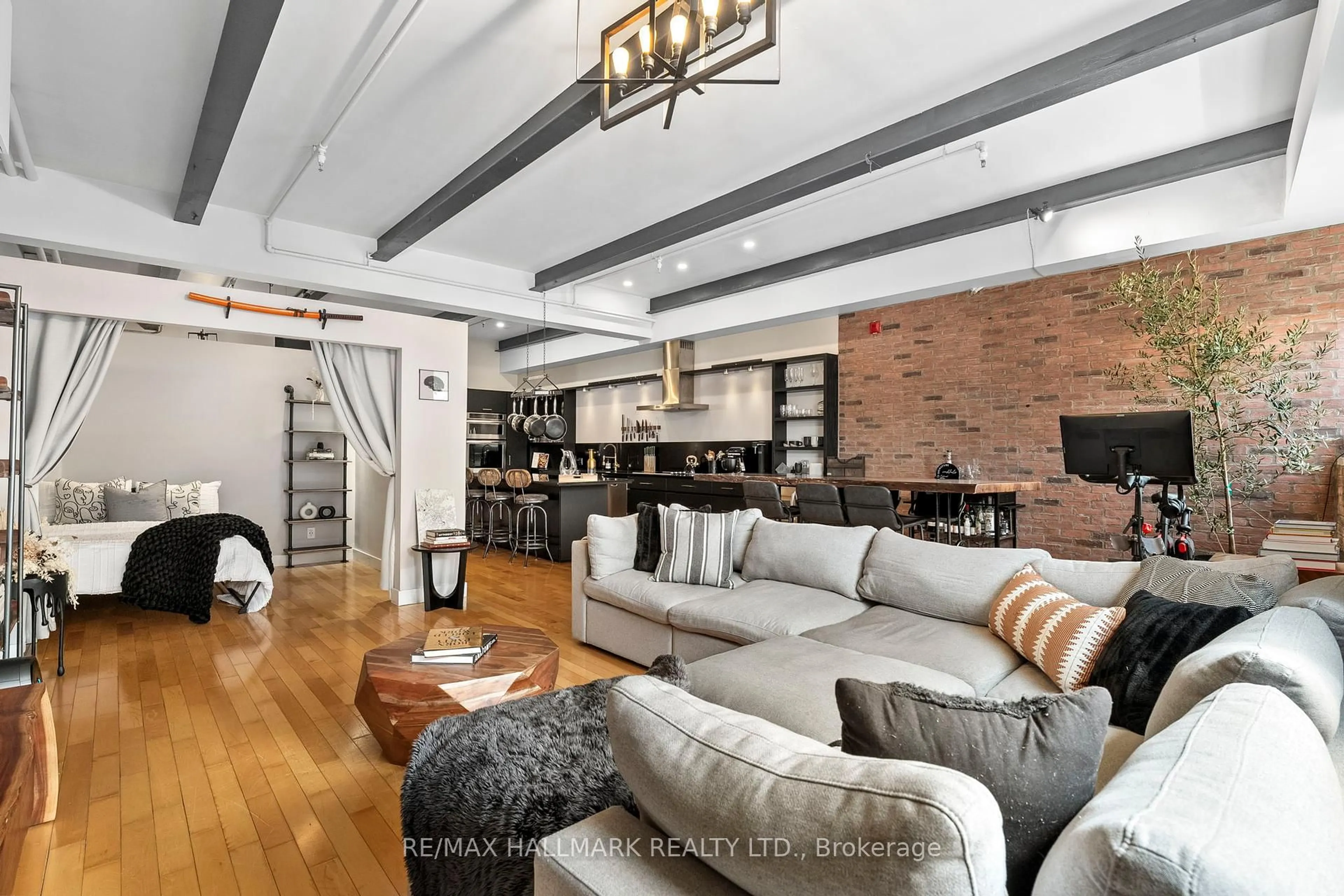 Living room with furniture, unknown for 326 Carlaw Ave #215, Toronto Ontario M4M 3N8