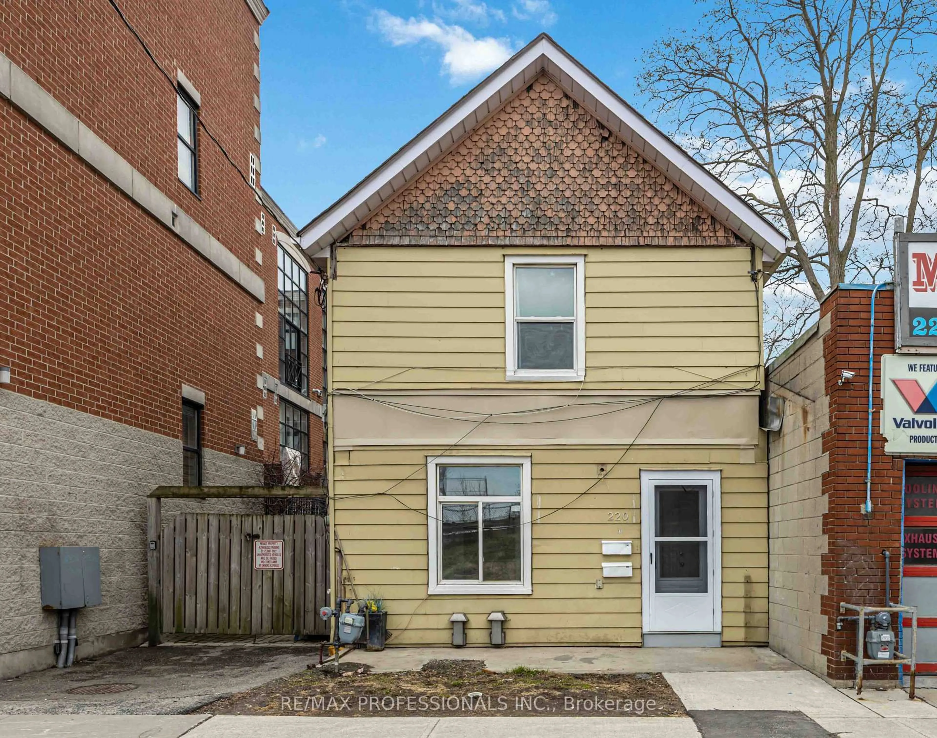 Home with brick exterior material, street for 220 Main St St, Toronto Ontario M4E 2W1