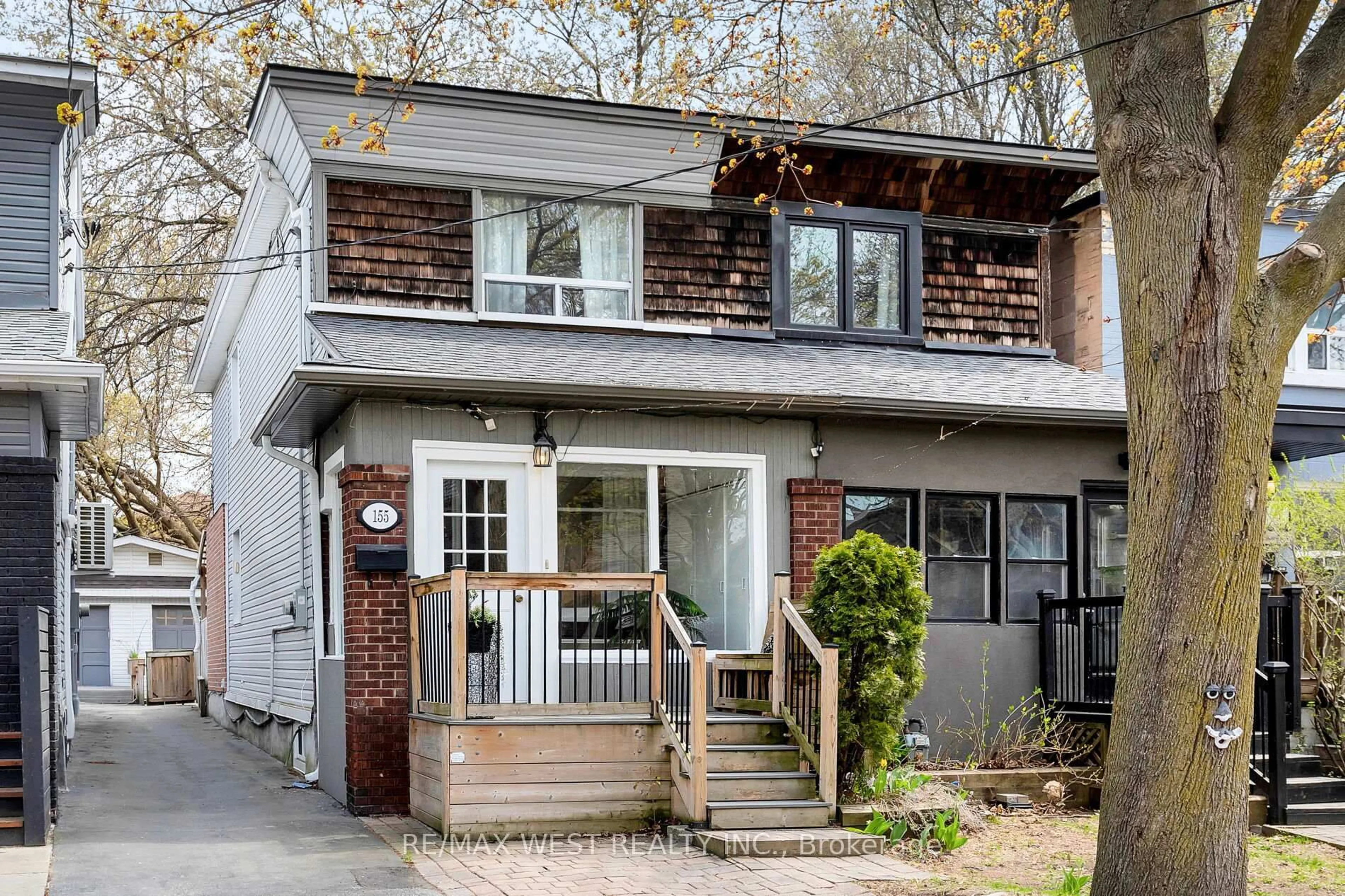 Home with brick exterior material, street for 155 Rhodes Ave, Toronto Ontario M4L 3A2