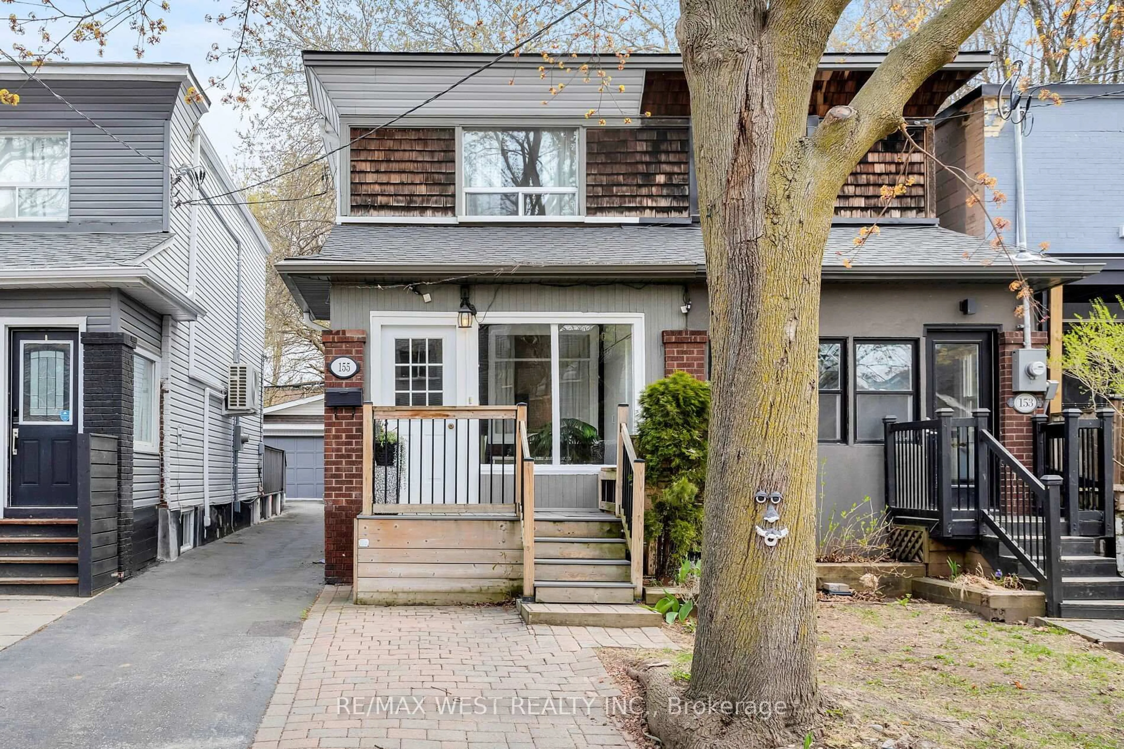 Home with brick exterior material, street for 155 Rhodes Ave, Toronto Ontario M4L 3A2