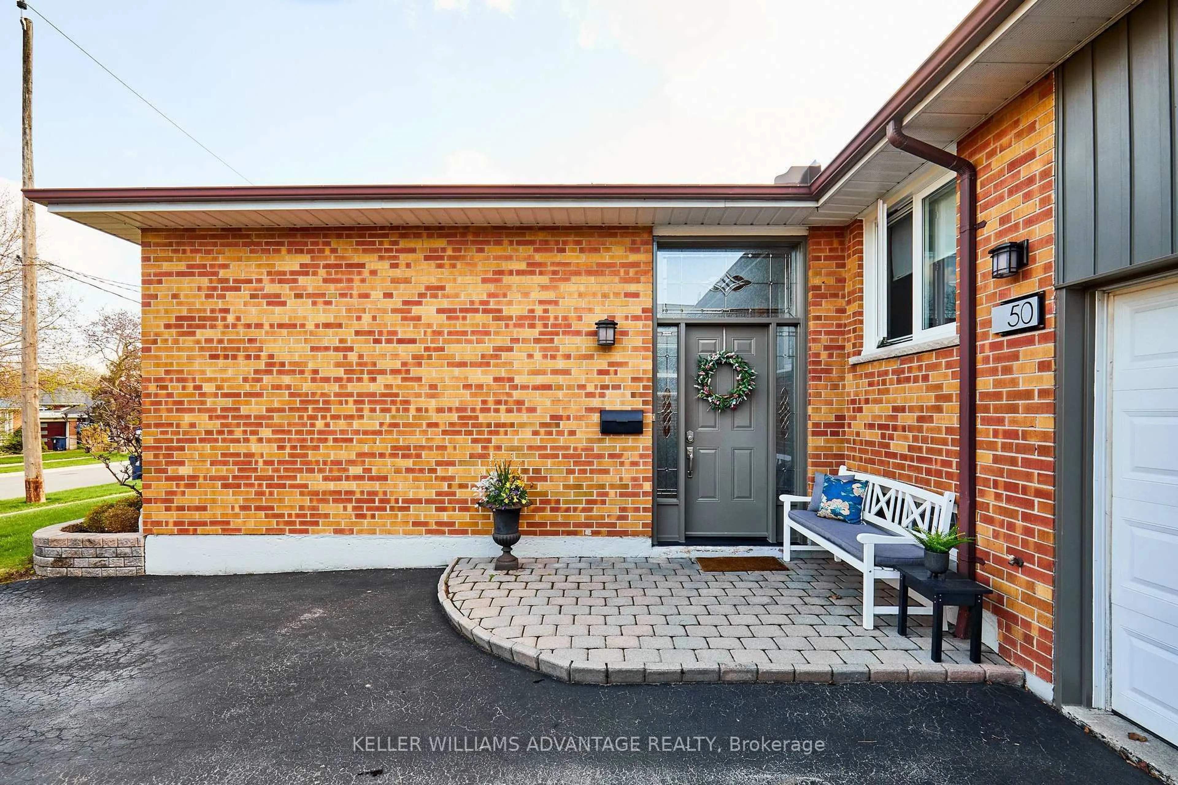 Home with brick exterior material, street for 50 Rowatson Rd, Toronto Ontario M1E 1K1