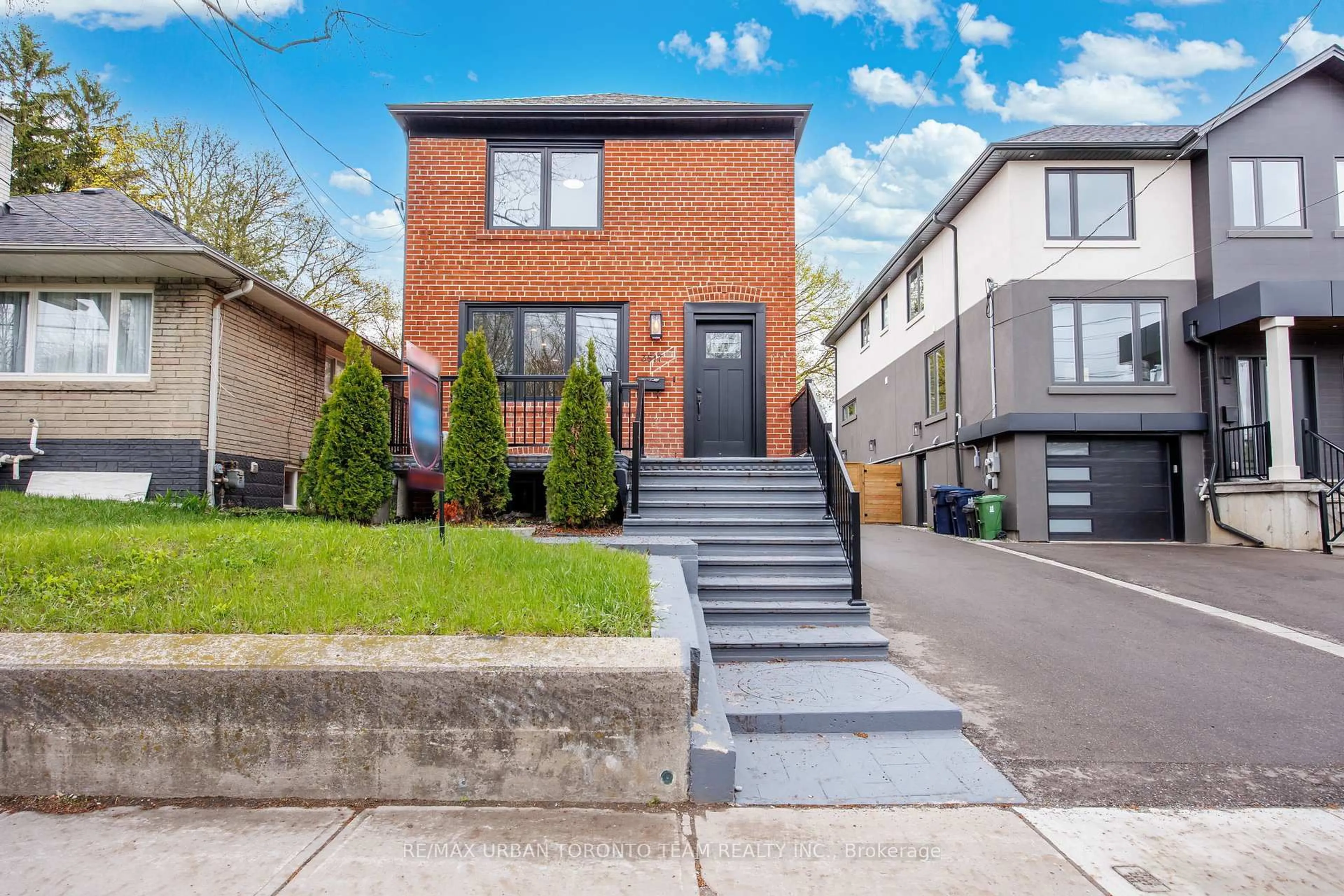 Home with brick exterior material, street for 3517 St Clair Ave, Toronto Ontario M1K 1L4