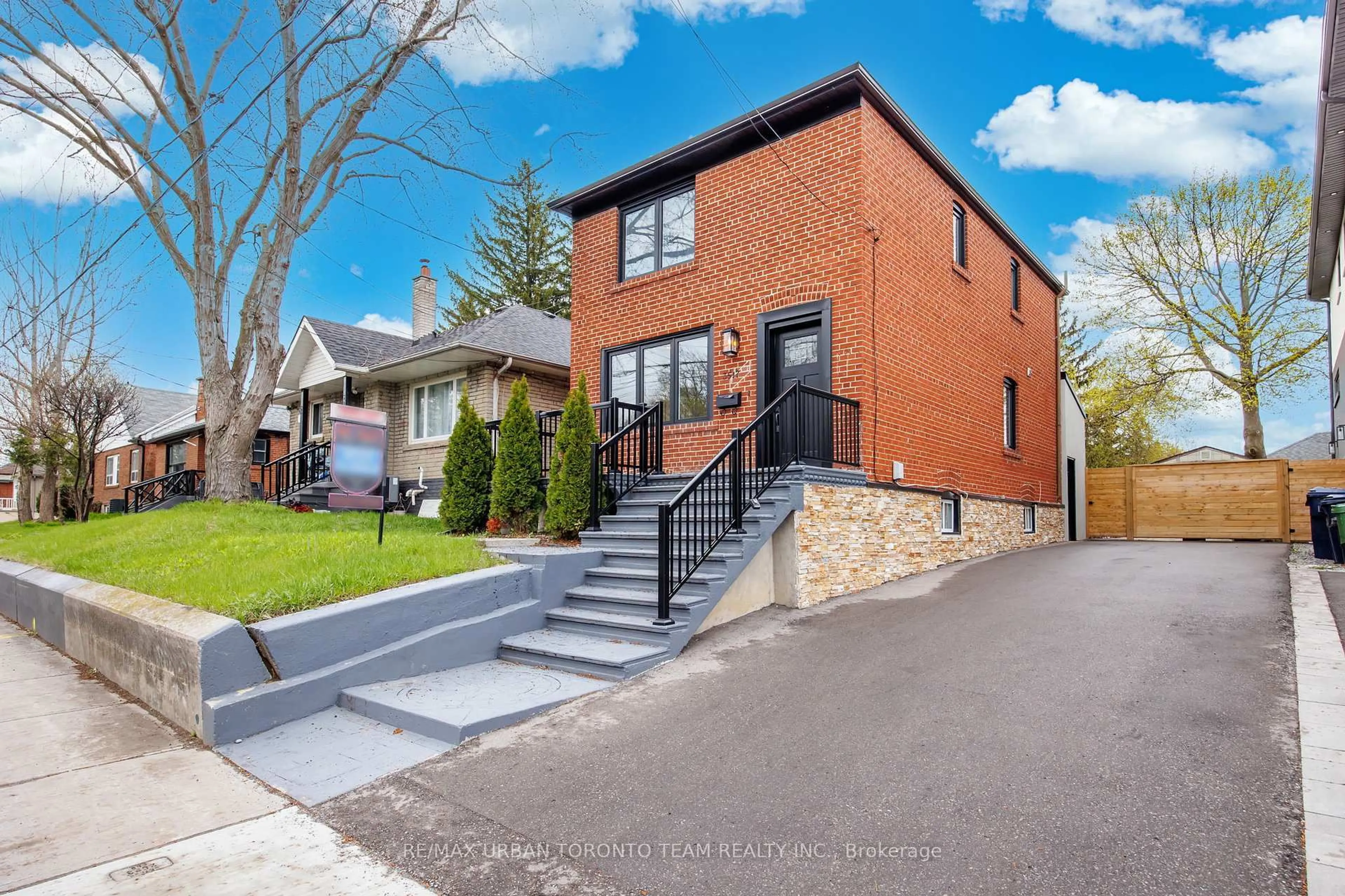 Home with brick exterior material, street for 3517 St Clair Ave, Toronto Ontario M1K 1L4