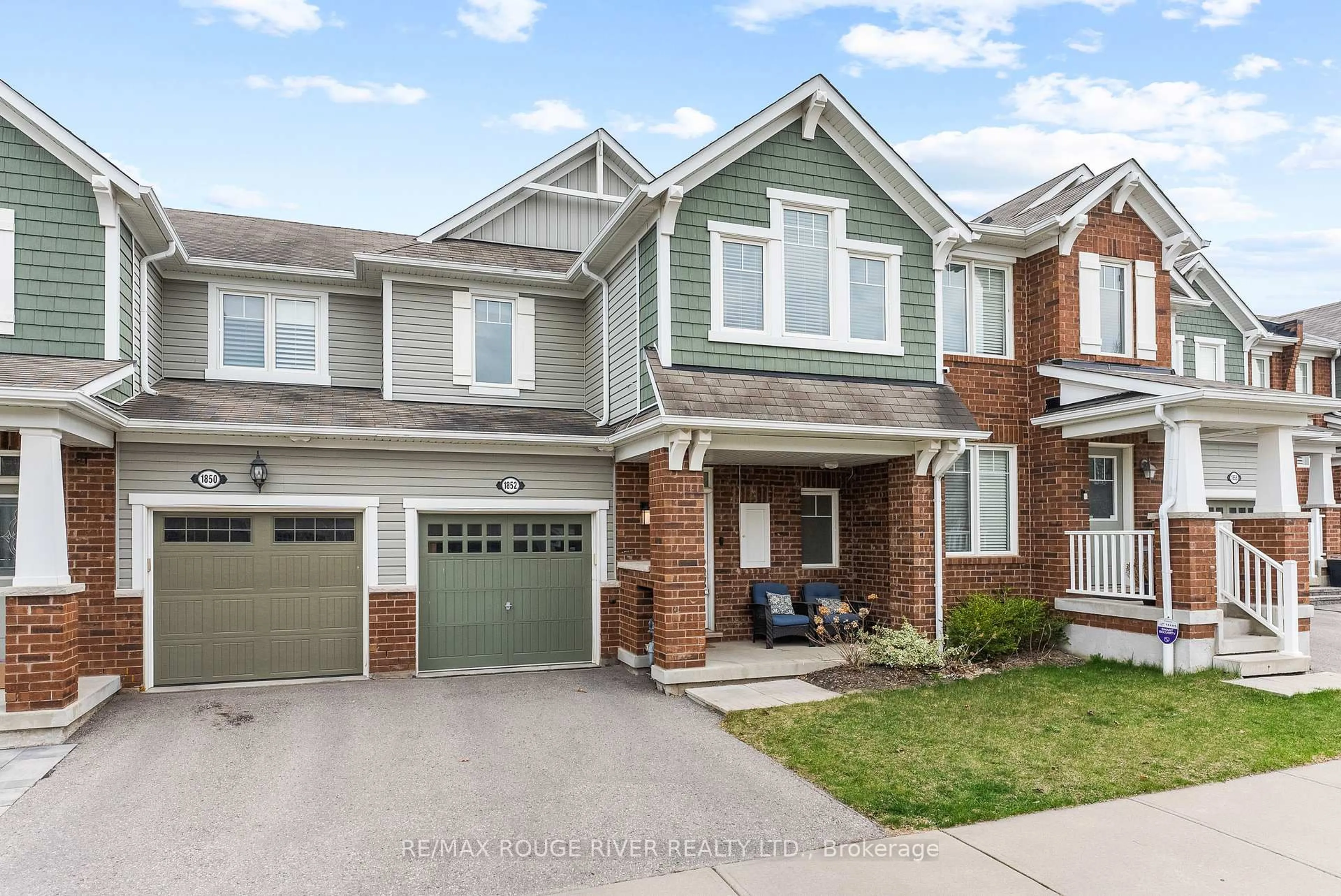 Home with brick exterior material, street for 1852 Liatris Dr, Pickering Ontario L1X 0A4