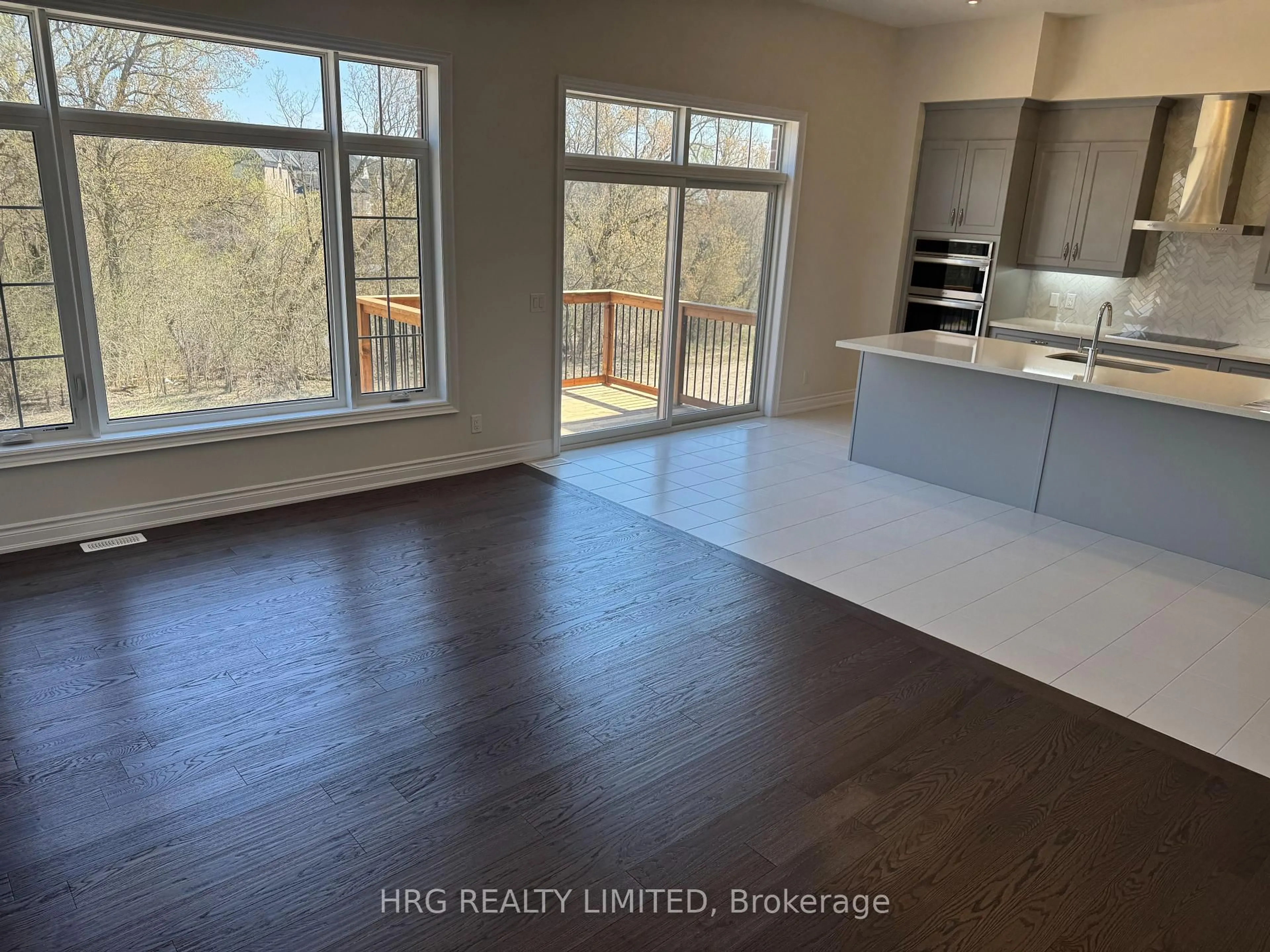 Open concept kitchen, wood/laminate floor for 100 Pheasant Ridge Dr, Whitby Ontario L1P 0P2