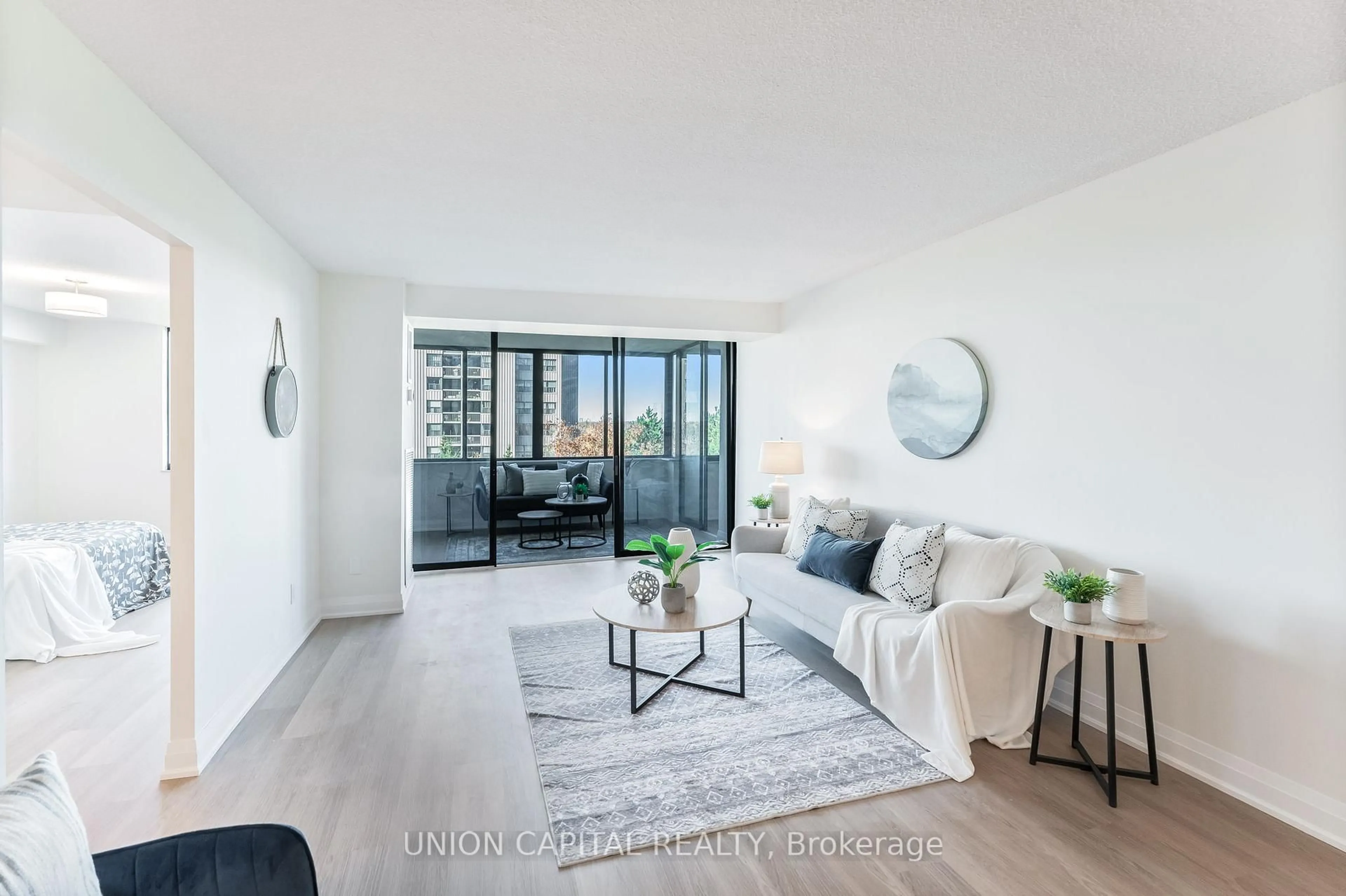Living room with furniture, unknown for 2350 Bridletowne Circ #611, Toronto Ontario M1W 3E6