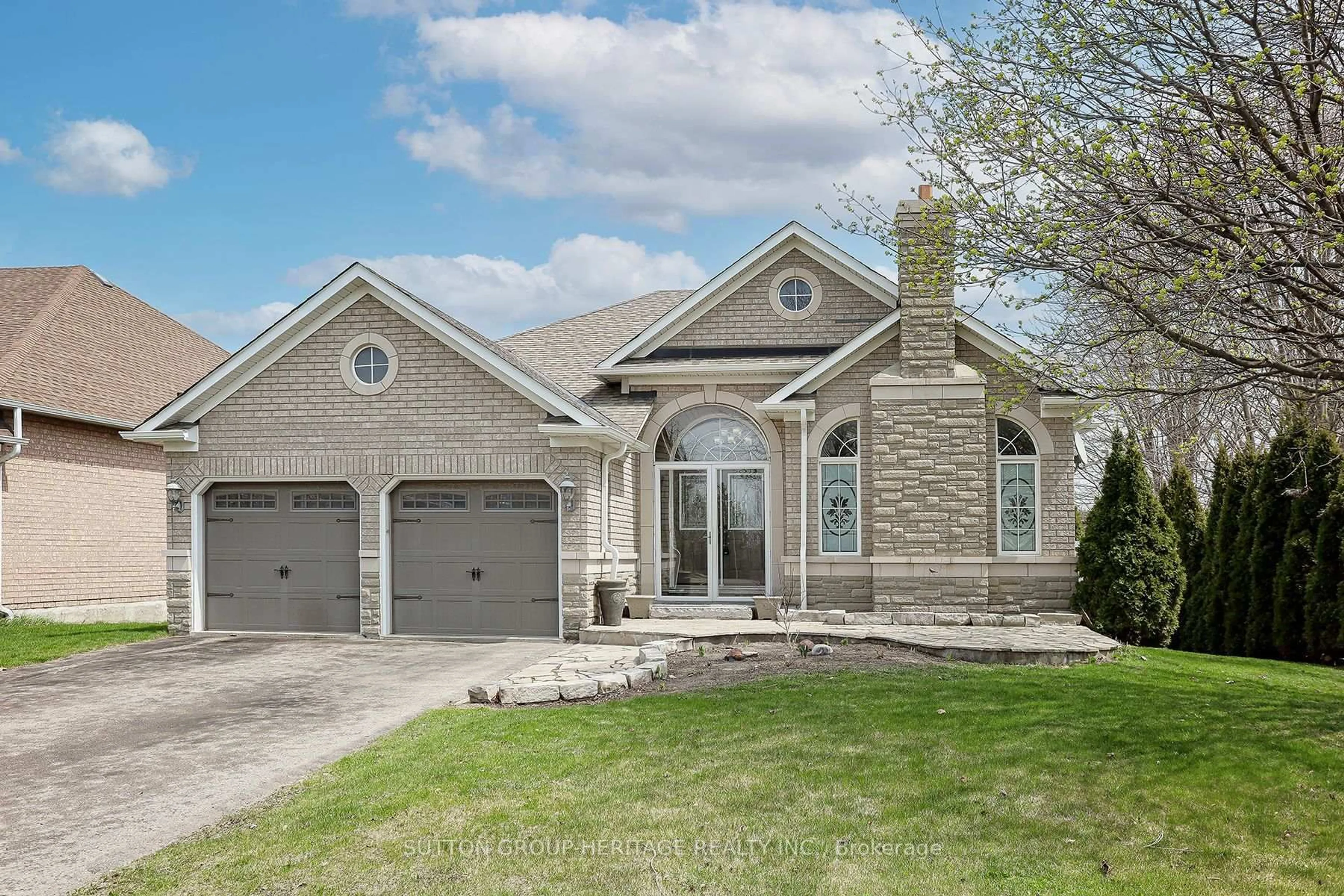 Home with brick exterior material, street for 57 Kimberly Dr, Whitby Ontario L1M 1K5