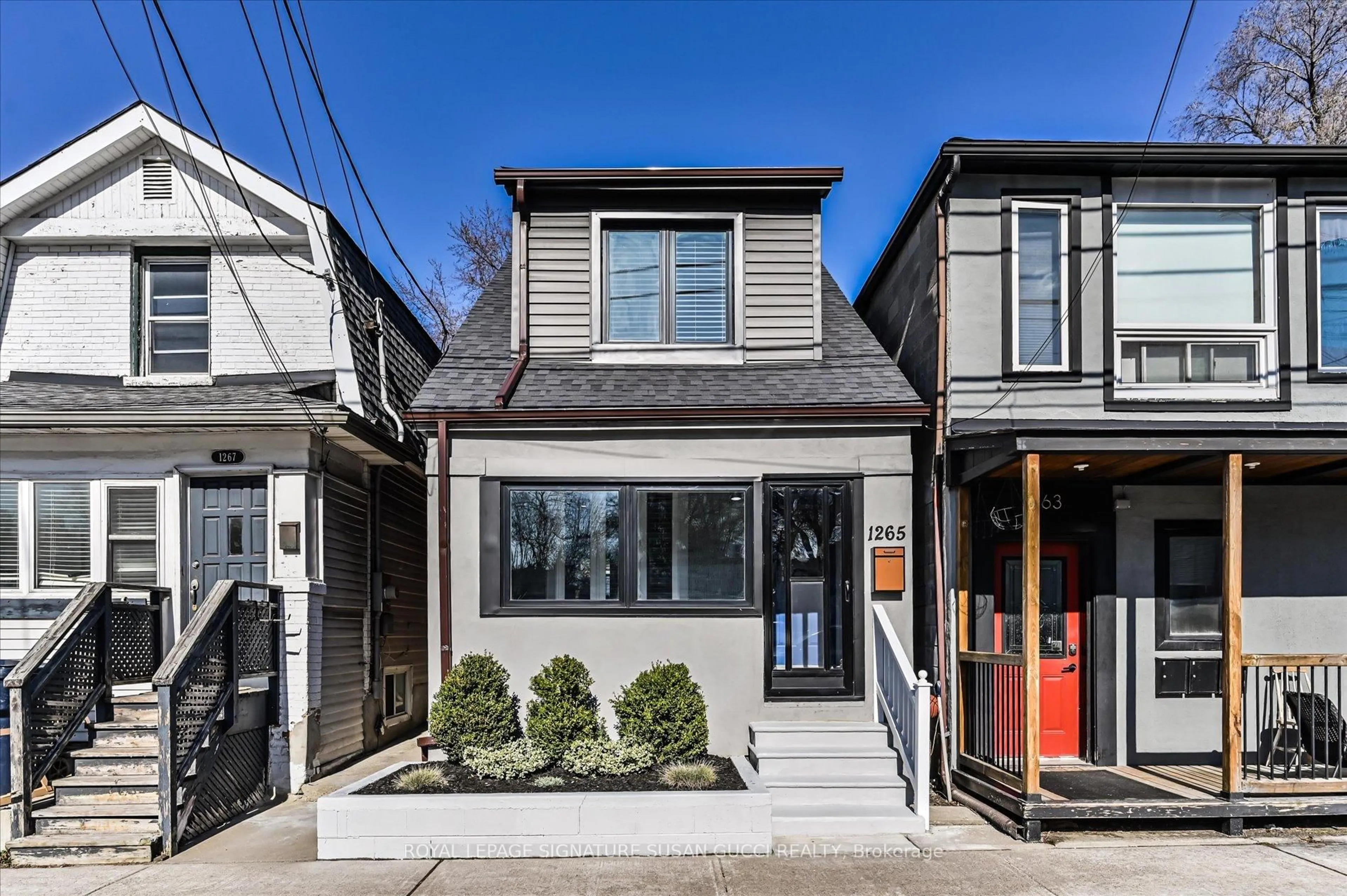 Home with brick exterior material, street for 1265 Woodbine Ave, Toronto Ontario M4C 4E5