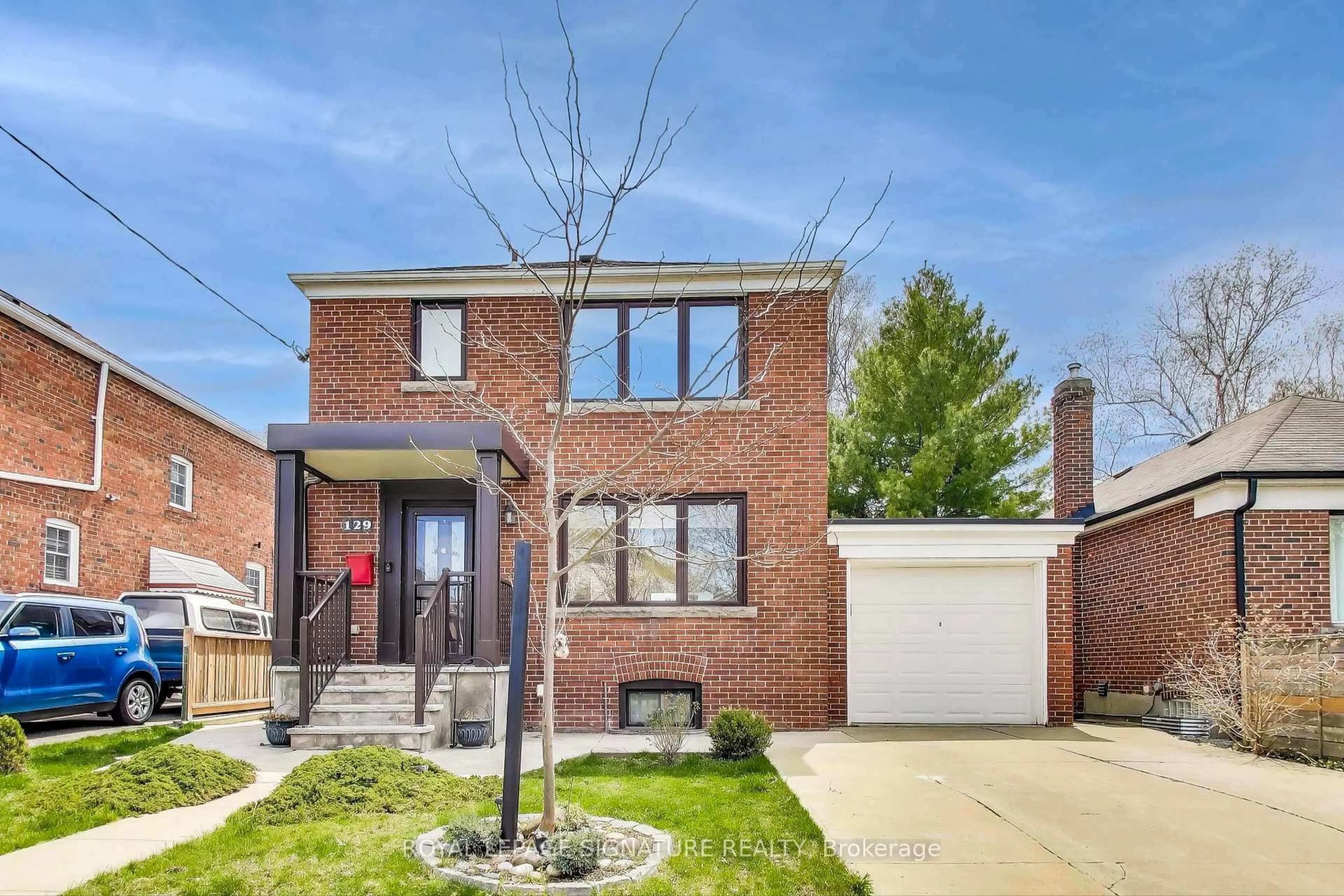 Home with brick exterior material, street for 129 Tiago Ave, Toronto Ontario M4B 2A6