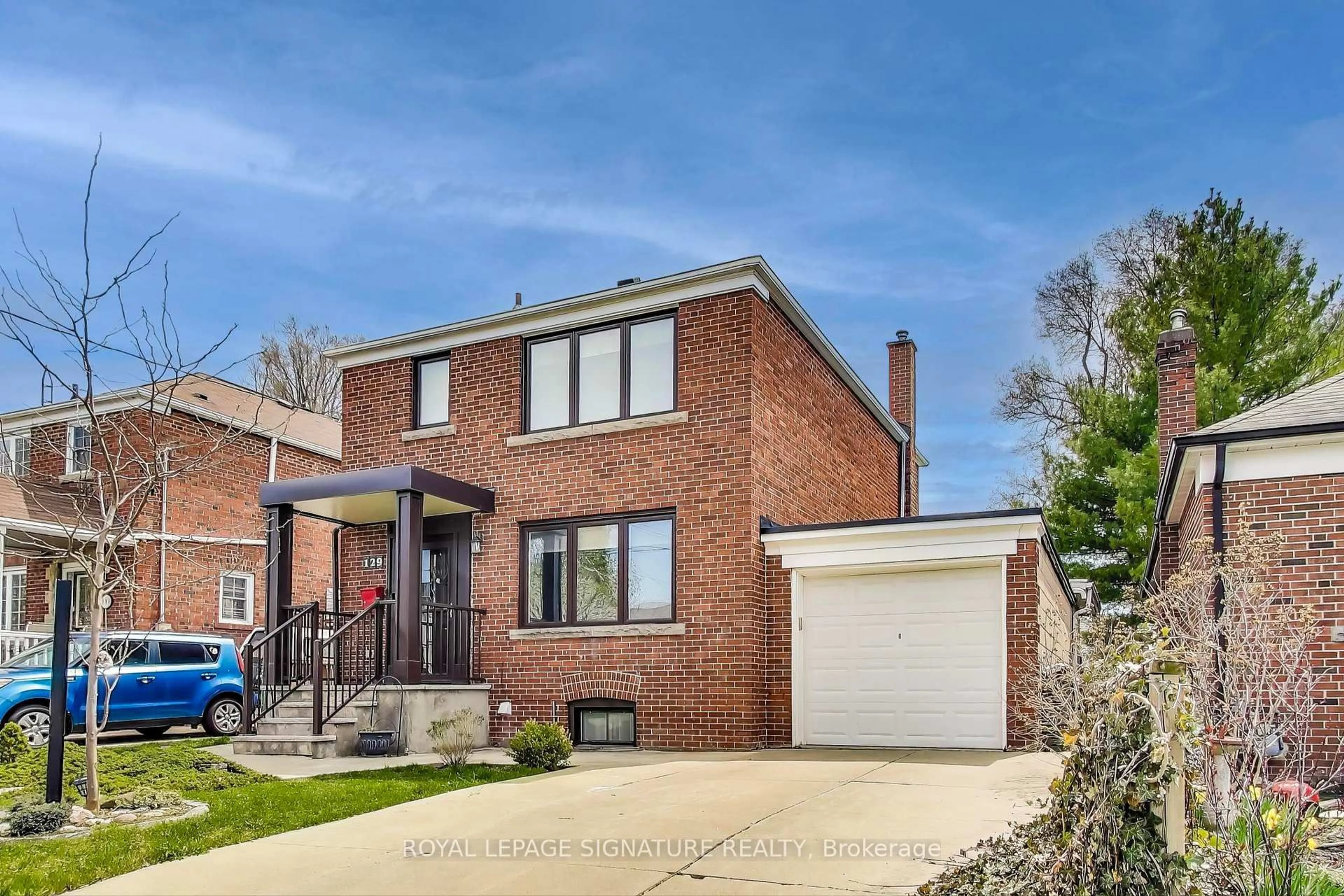 Home with brick exterior material, street for 129 Tiago Ave, Toronto Ontario M4B 2A6