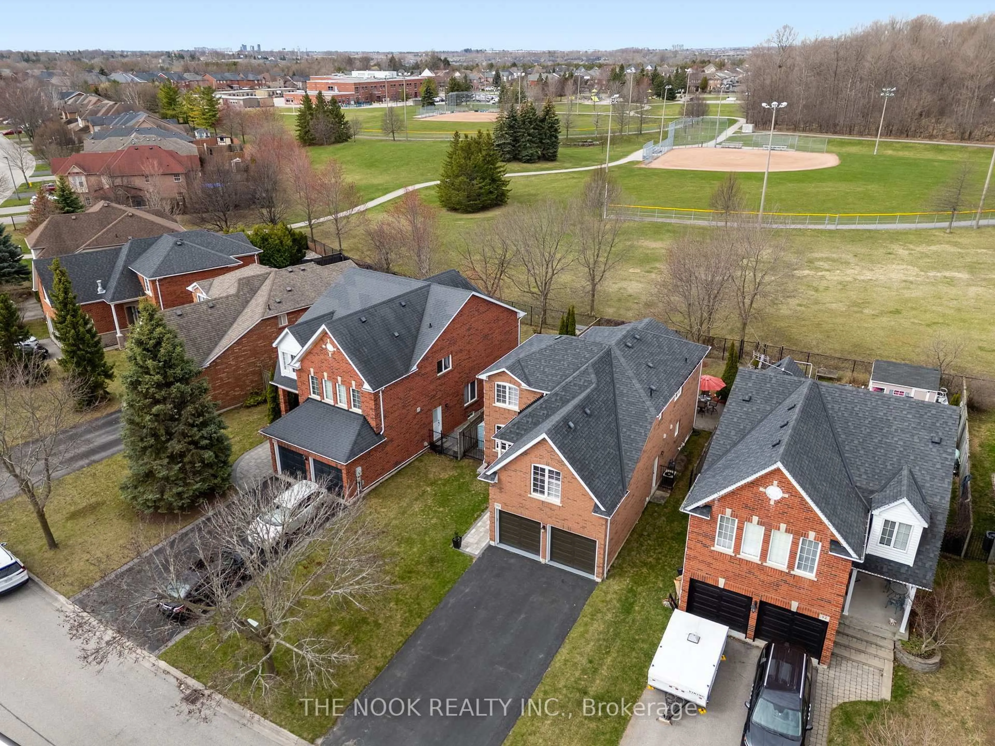 A pic from outside/outdoor area/front of a property/back of a property/a pic from drone, unknown for 90 Gartshore Dr, Whitby Ontario L1P 1N8