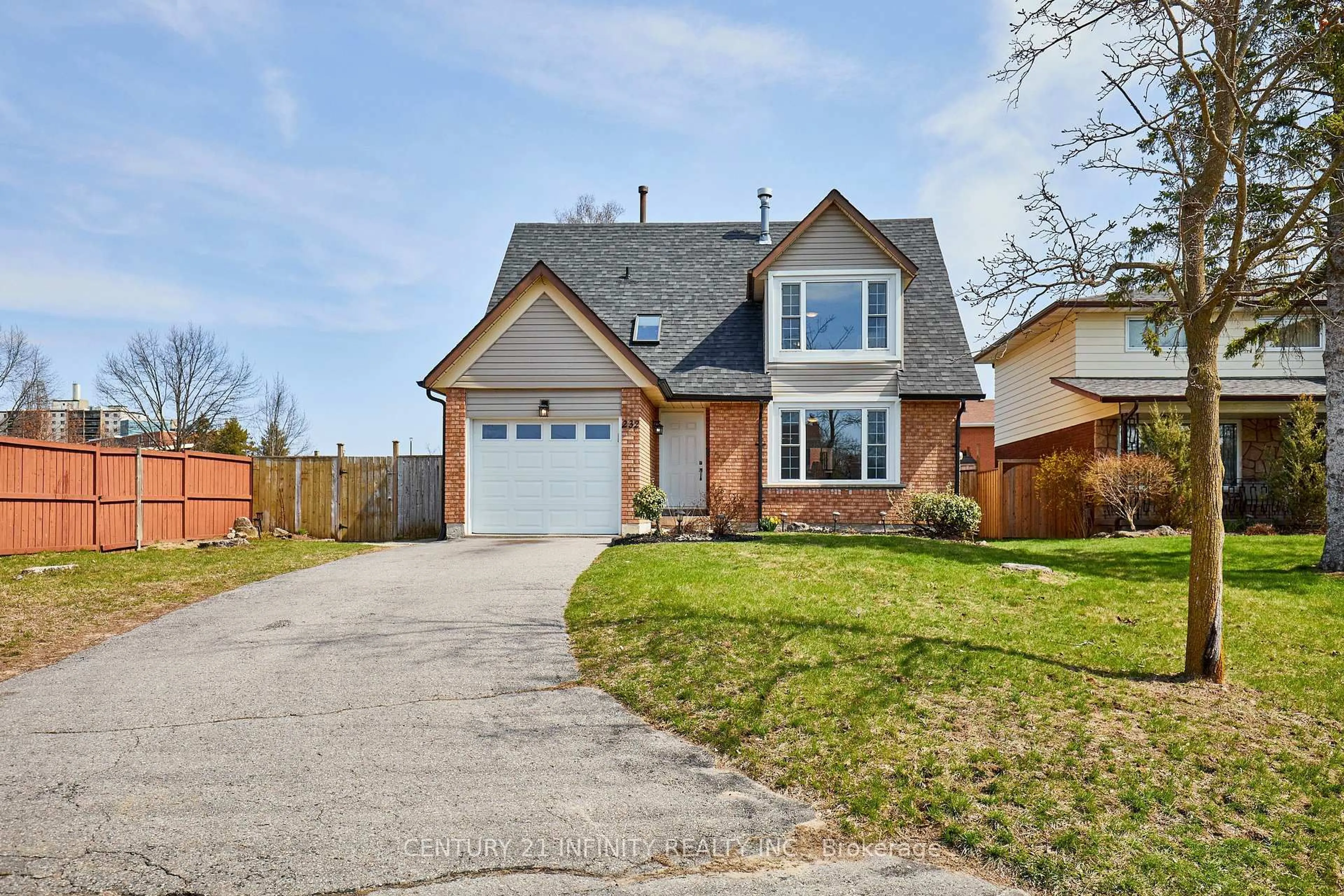 Home with brick exterior material, street for 232 Iris Crt, Oshawa Ontario L1G 7M1
