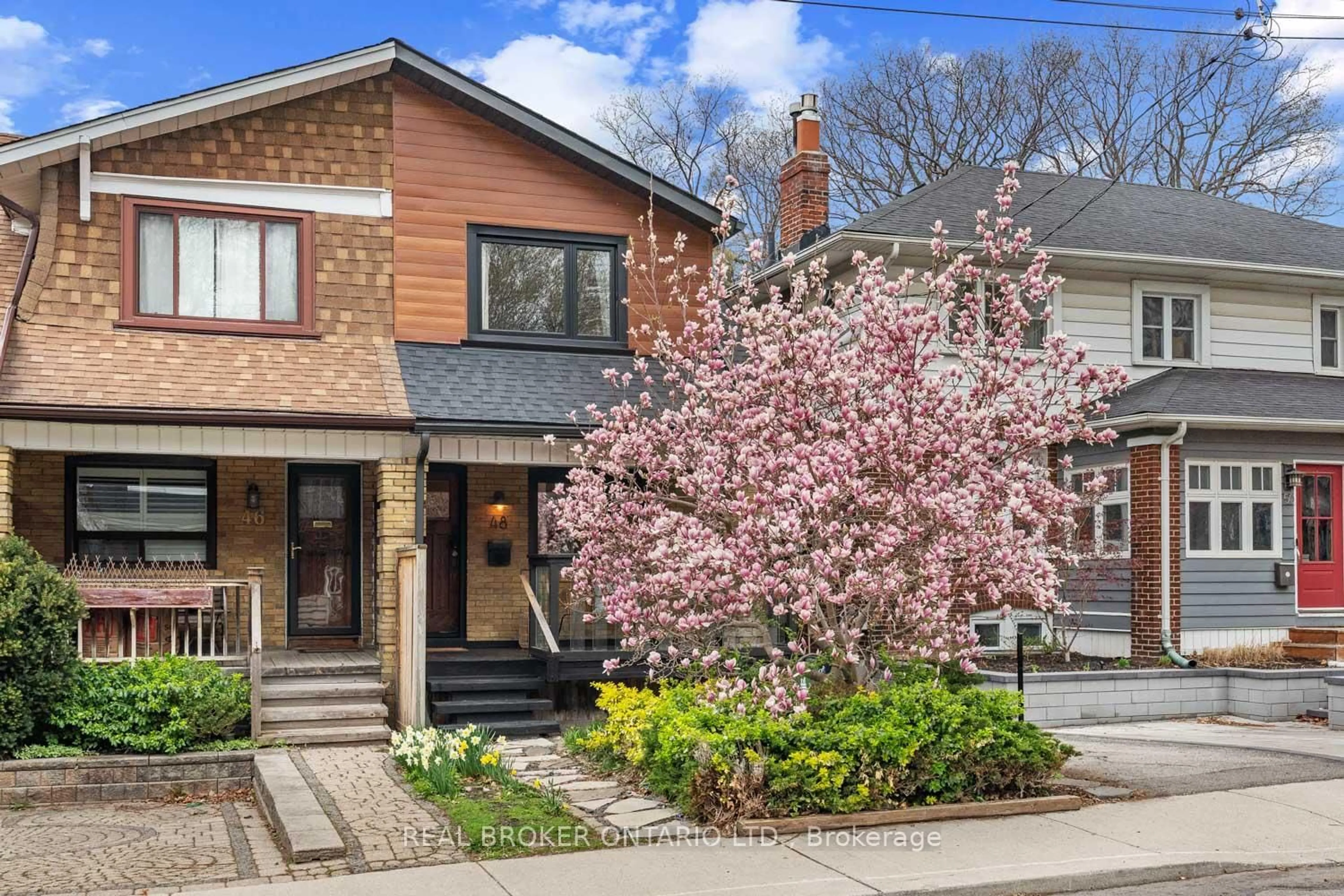 Home with brick exterior material, street for 48 Gainsborough Rd, Toronto Ontario M4L 3C2