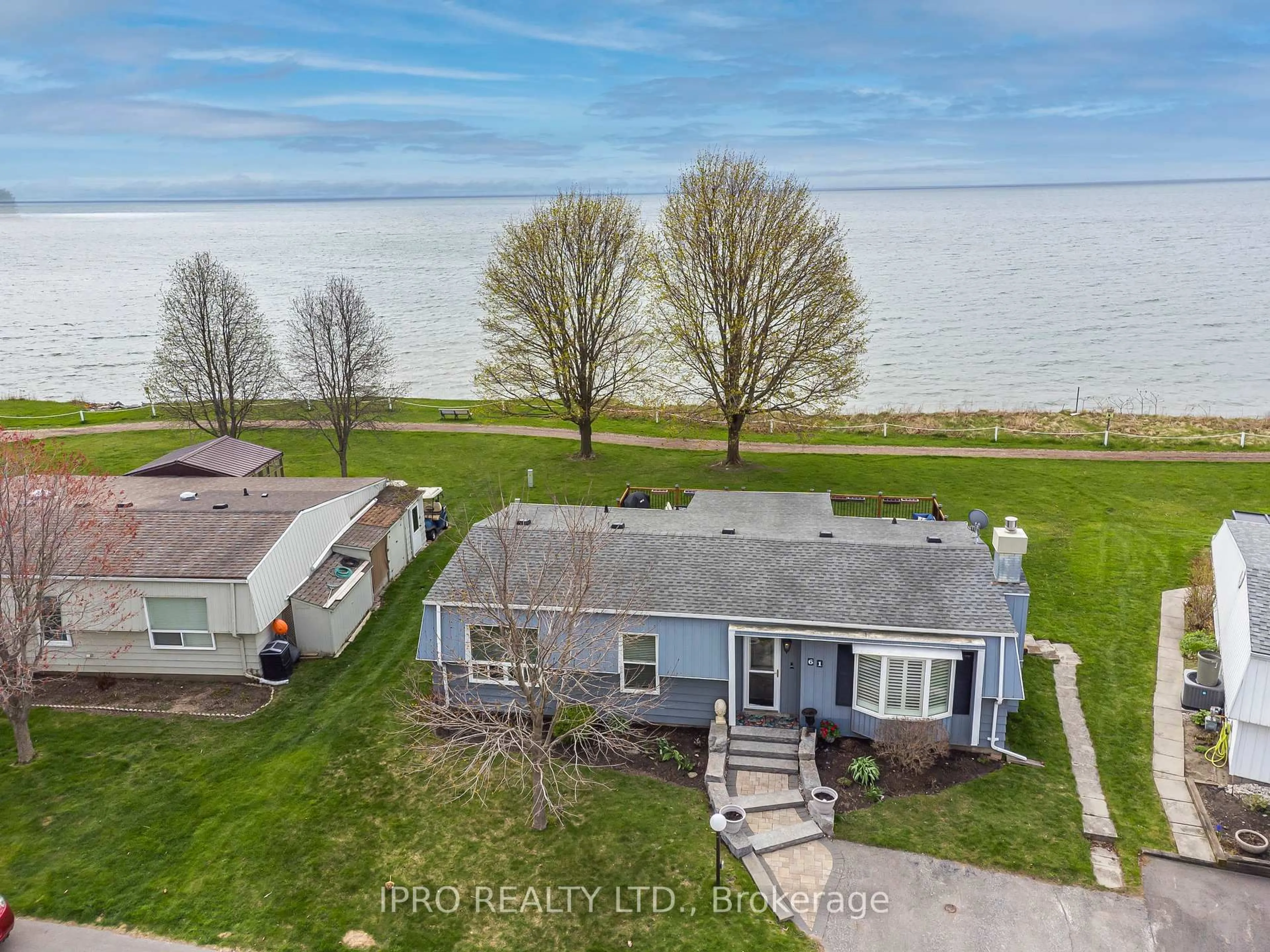 A pic from outside/outdoor area/front of a property/back of a property/a pic from drone, water/lake/river/ocean view for 61 Bluffs Rd, Clarington Ontario L1B 1A6
