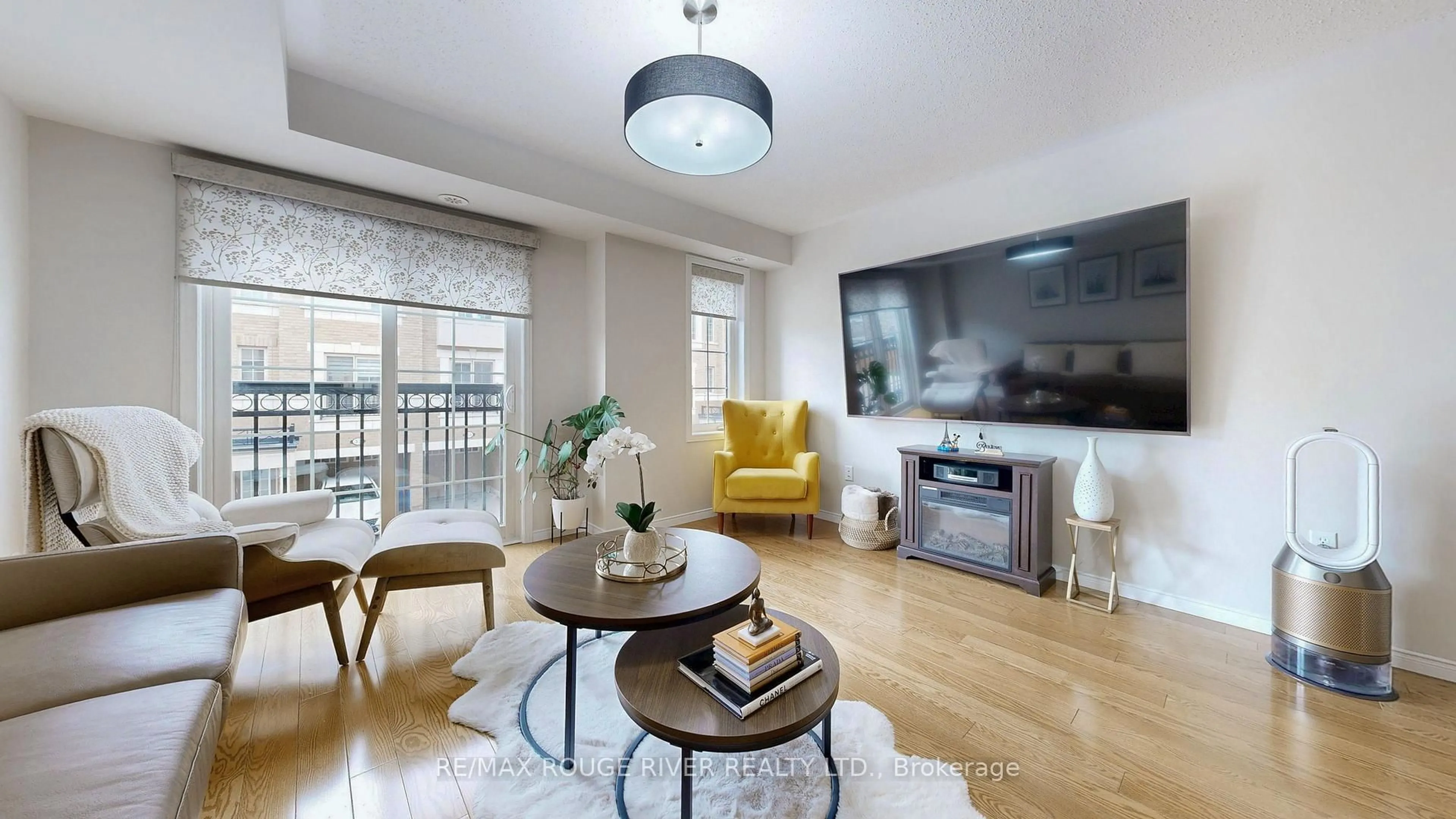 Living room with furniture, wood/laminate floor for 34 Icy Note Path, Oshawa Ontario L1L 0L1