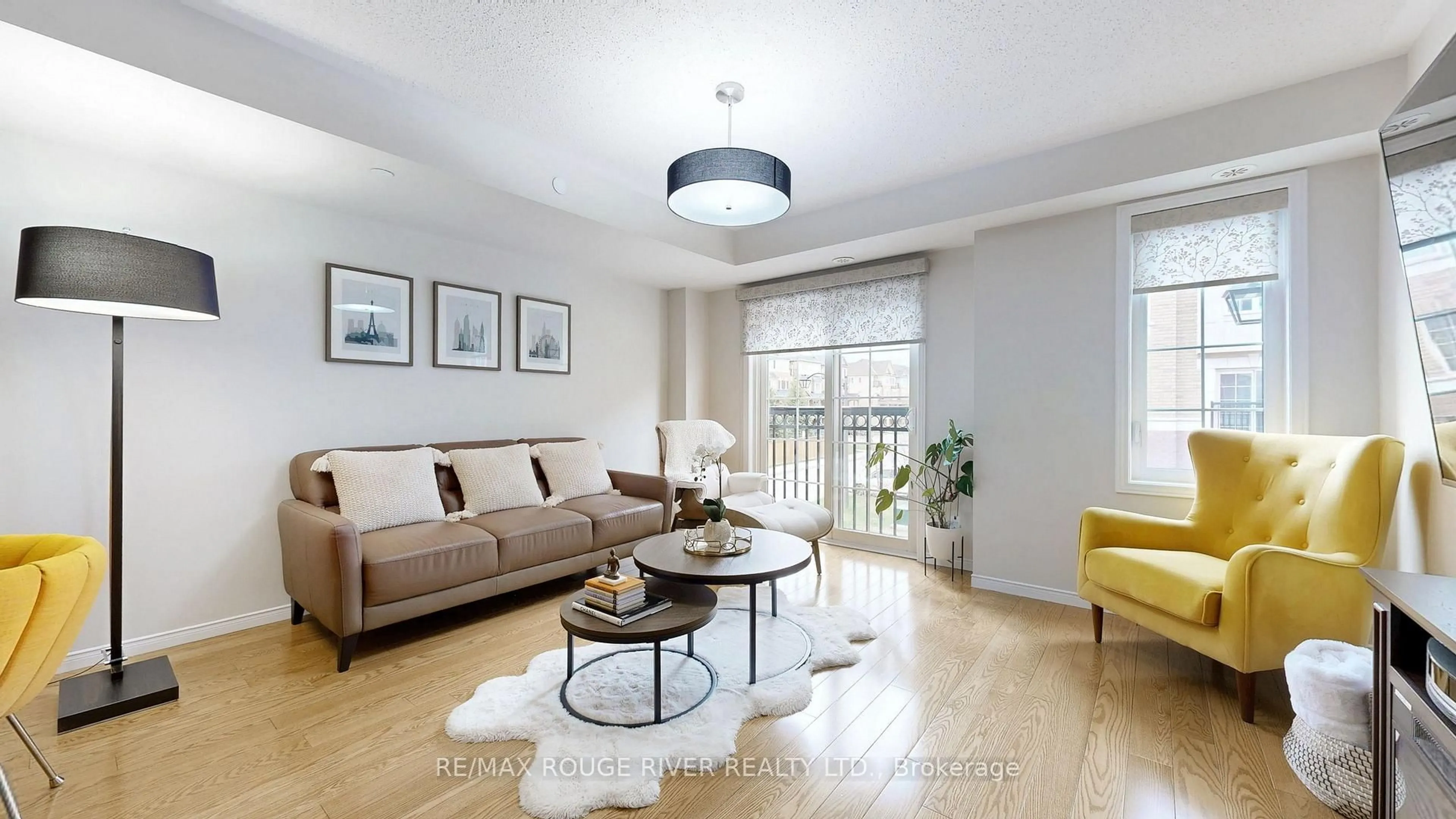 Living room with furniture, wood/laminate floor for 34 Icy Note Path, Oshawa Ontario L1L 0L1