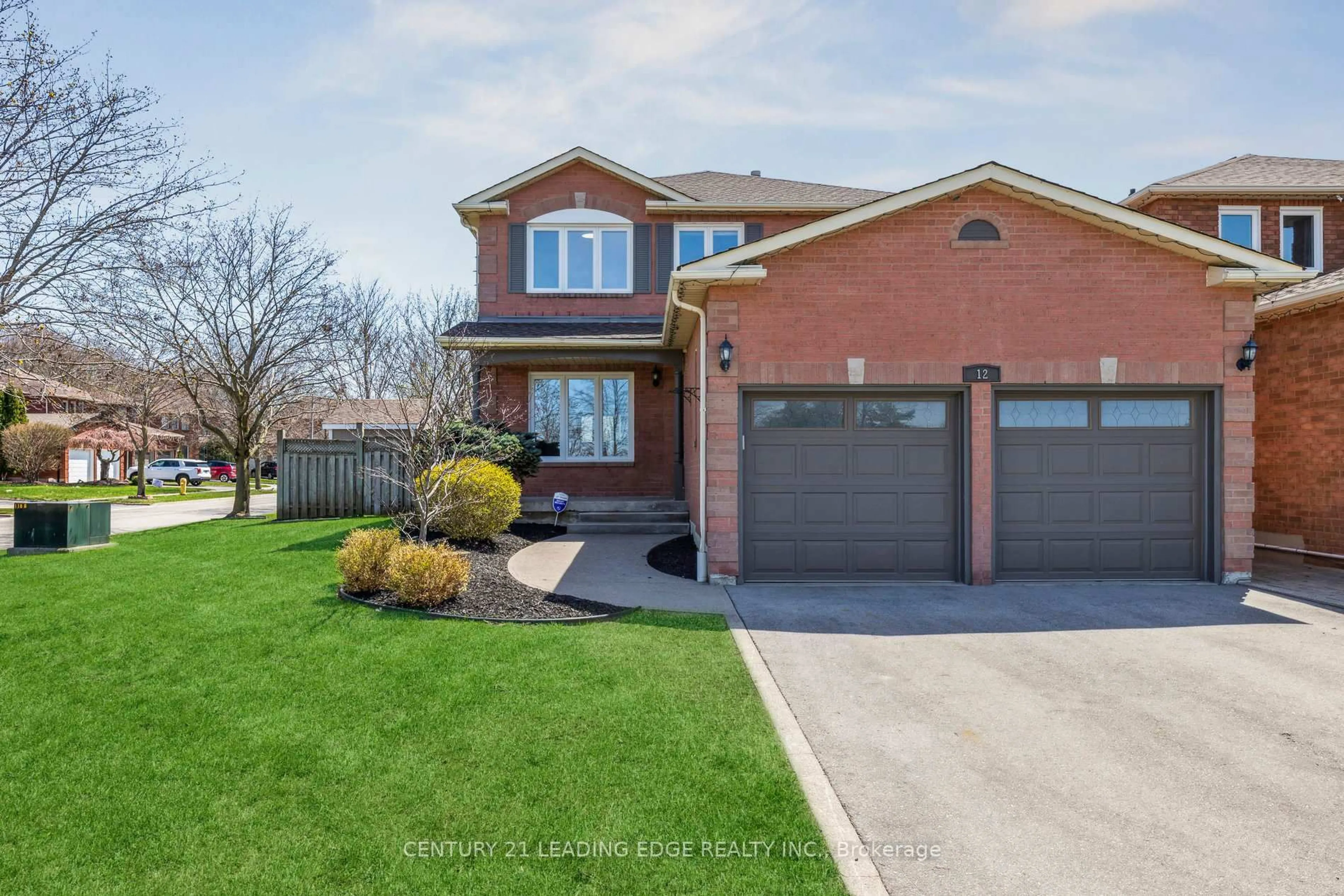 Home with brick exterior material, street for 12 Turriff Cres, Ajax Ontario L1T 3N4