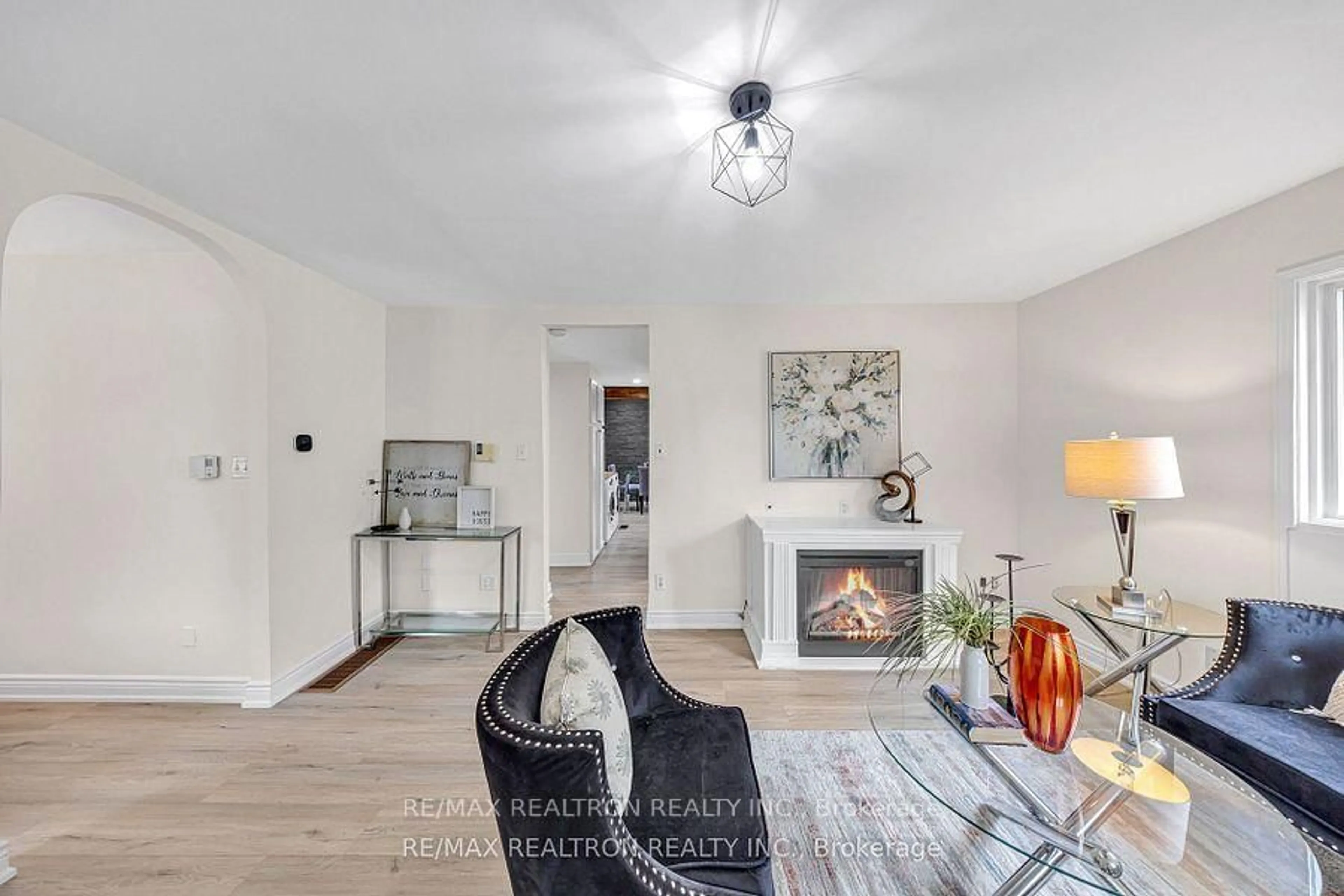 Living room with furniture, wood/laminate floor for 8 Maple St, Ajax Ontario L1S 1V6
