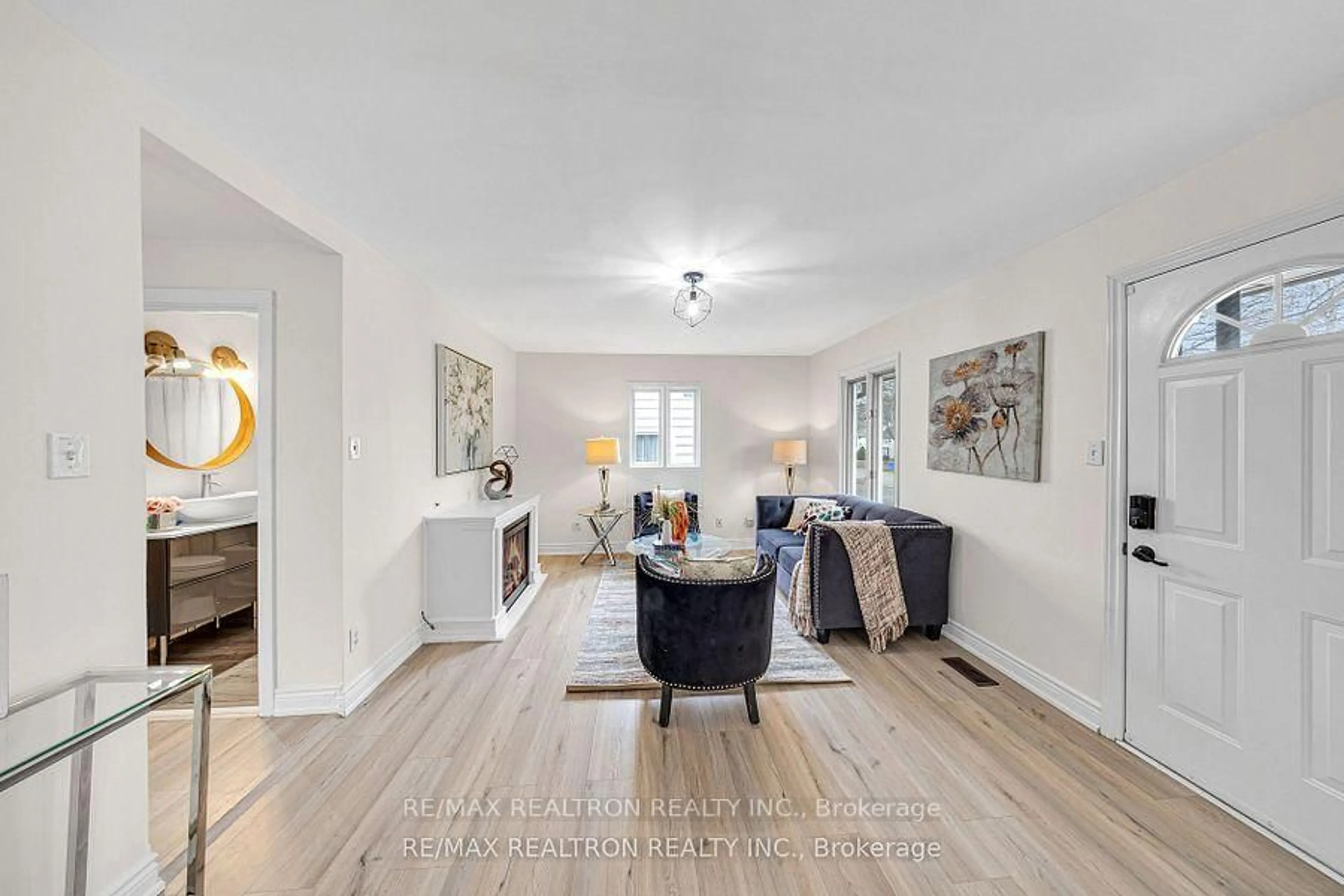 Living room with furniture, wood/laminate floor for 8 Maple St, Ajax Ontario L1S 1V6