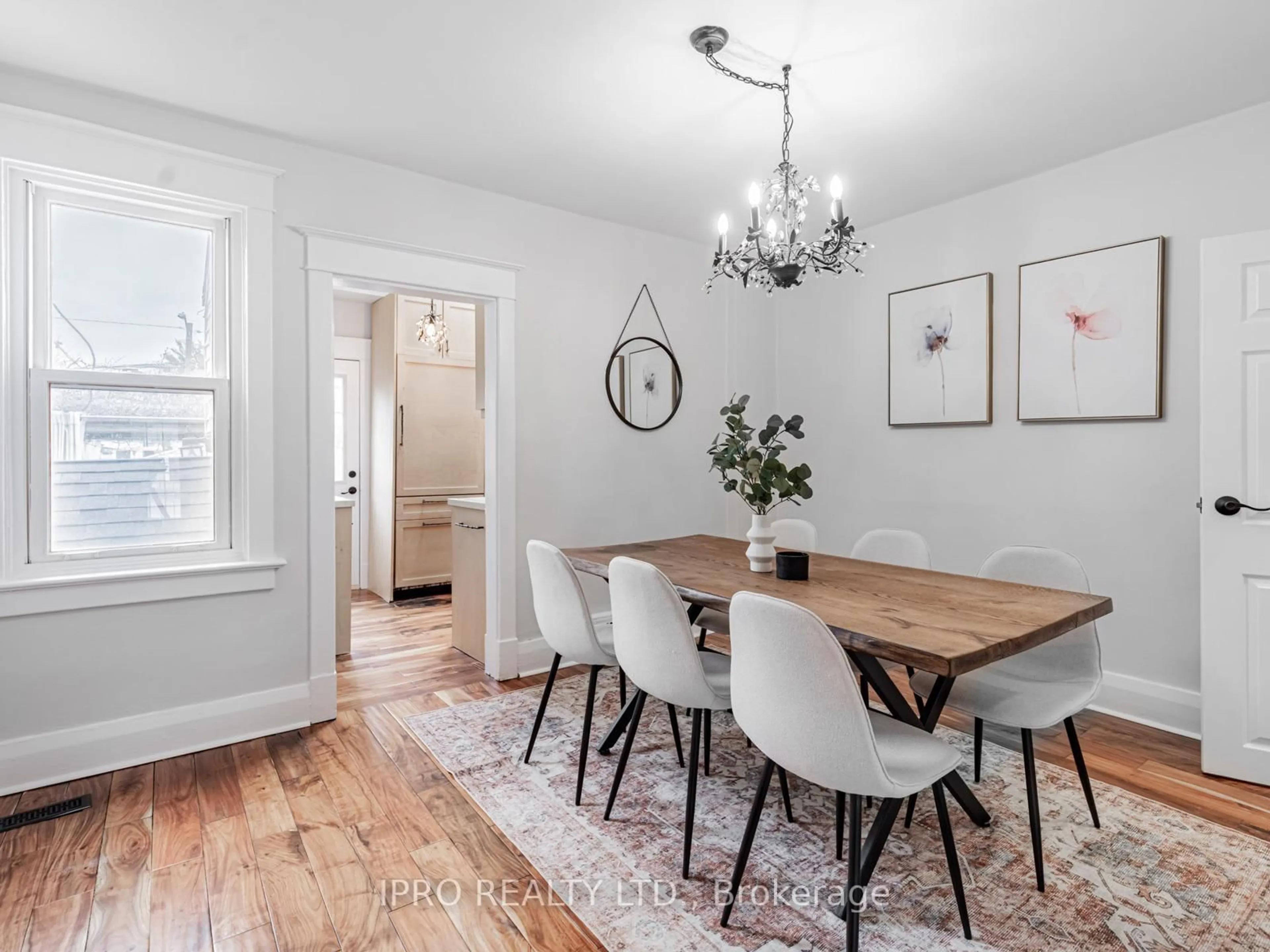 Dining room, wood/laminate floor for 111 Chisholm Ave, Toronto Ontario M4C 4V6