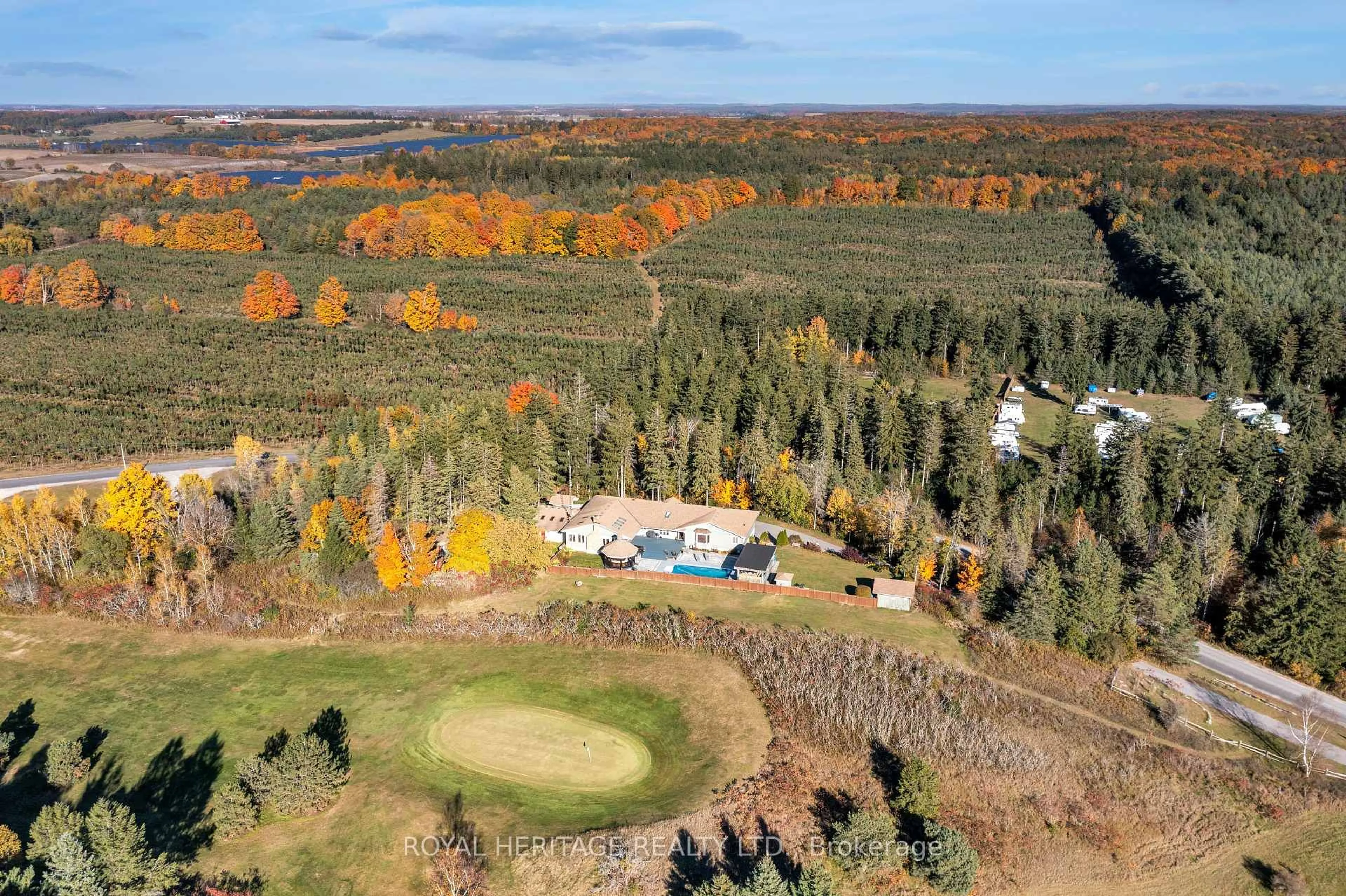 A pic from outside/outdoor area/front of a property/back of a property/a pic from drone, forest/trees view for 10420 Russell Rd, Scugog Ontario L9L 1B3
