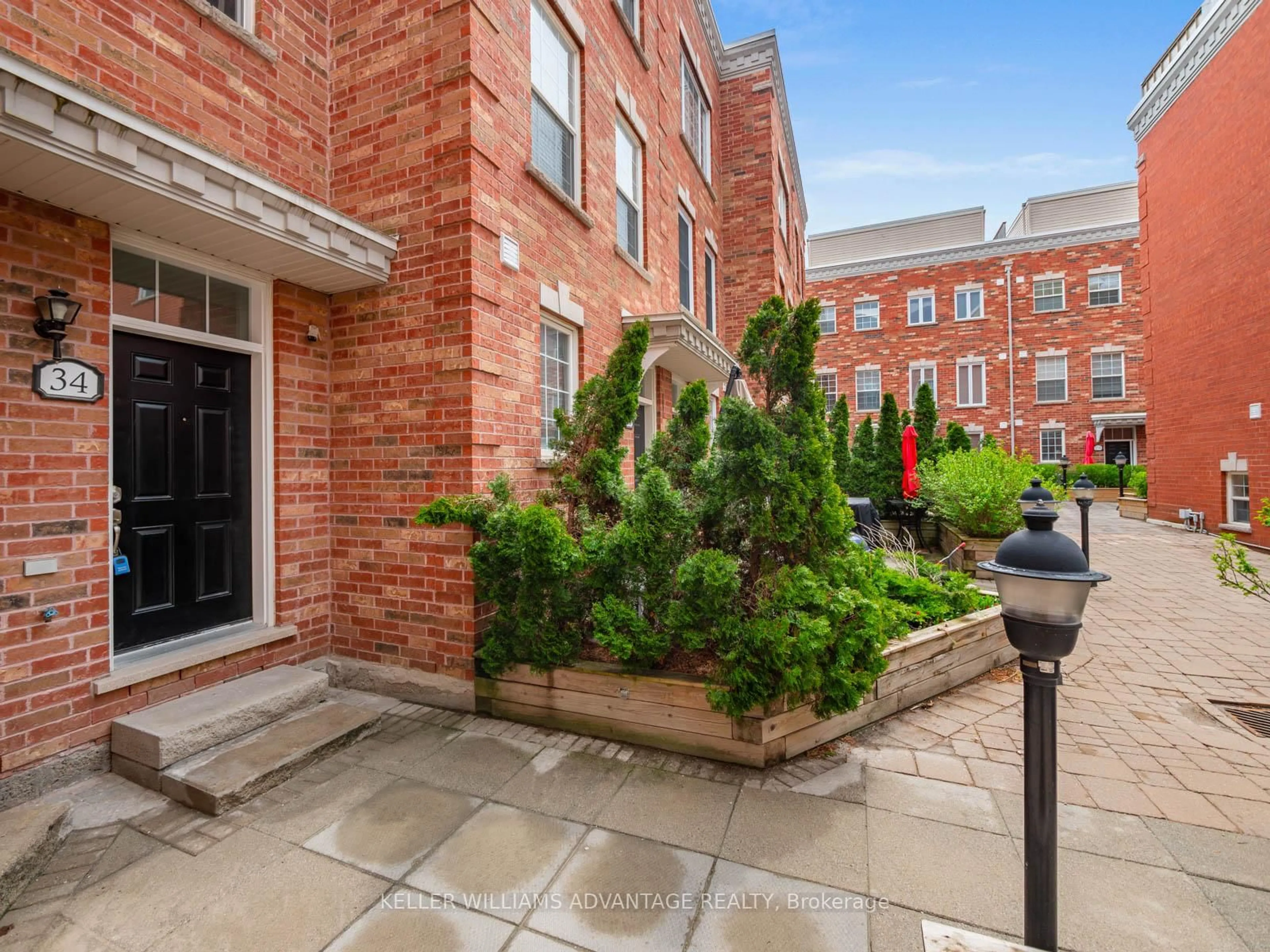 Patio, street for 34 Fairhead Mews, Toronto Ontario M4E 3Y4