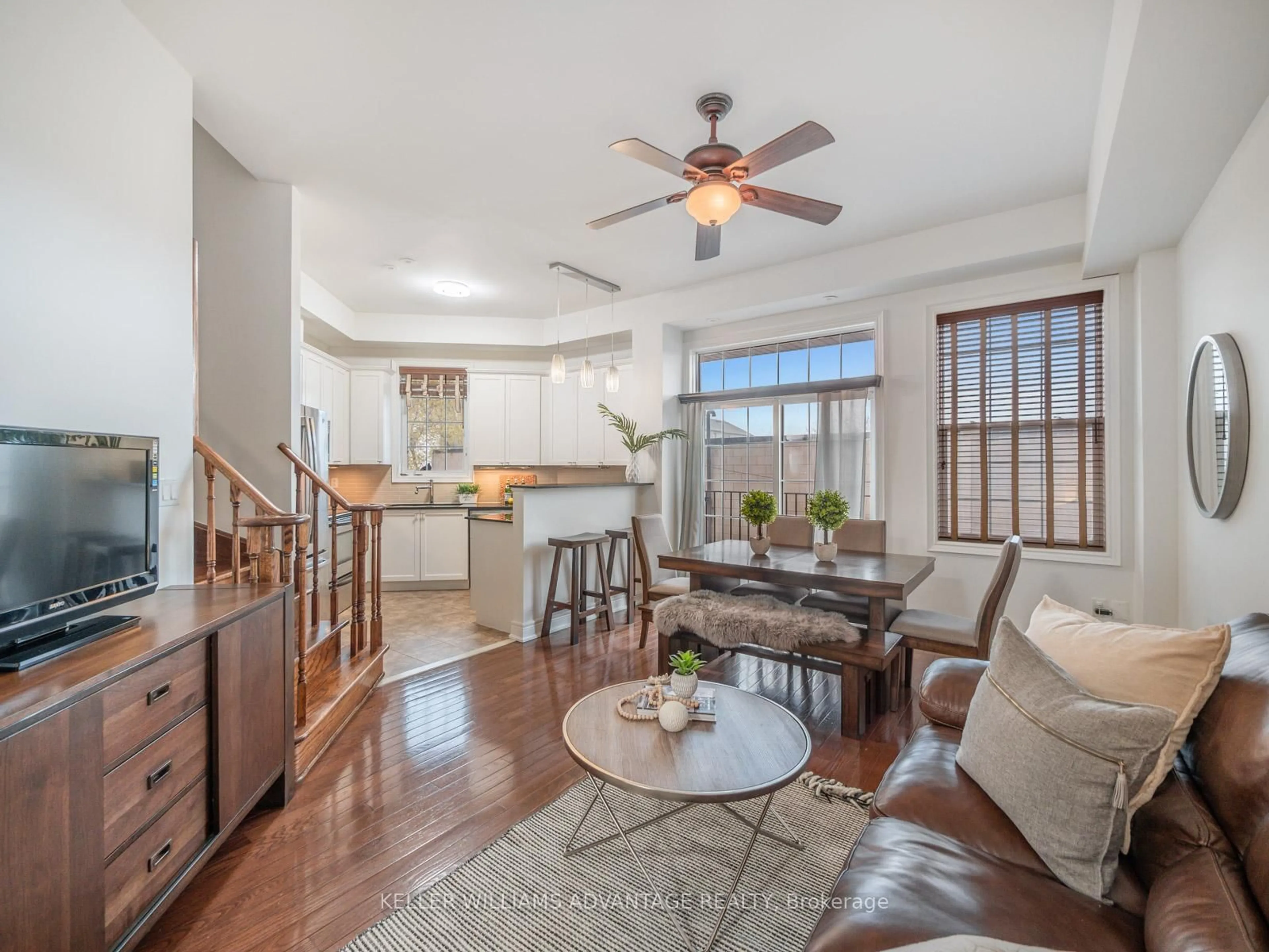 Living room with furniture, unknown for 34 Fairhead Mews, Toronto Ontario M4E 3Y4