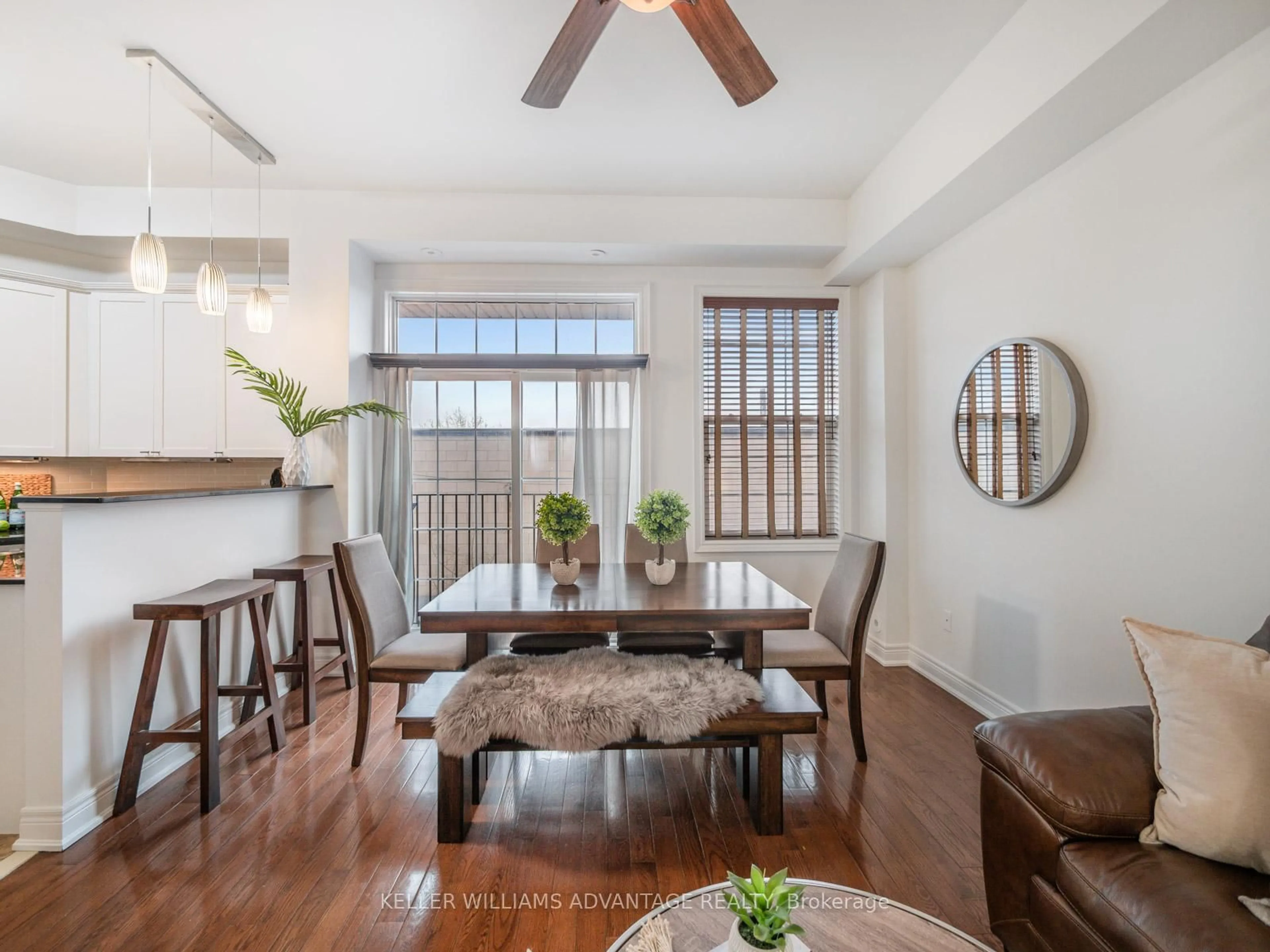 Dining room, wood/laminate floor for 34 Fairhead Mews, Toronto Ontario M4E 3Y4