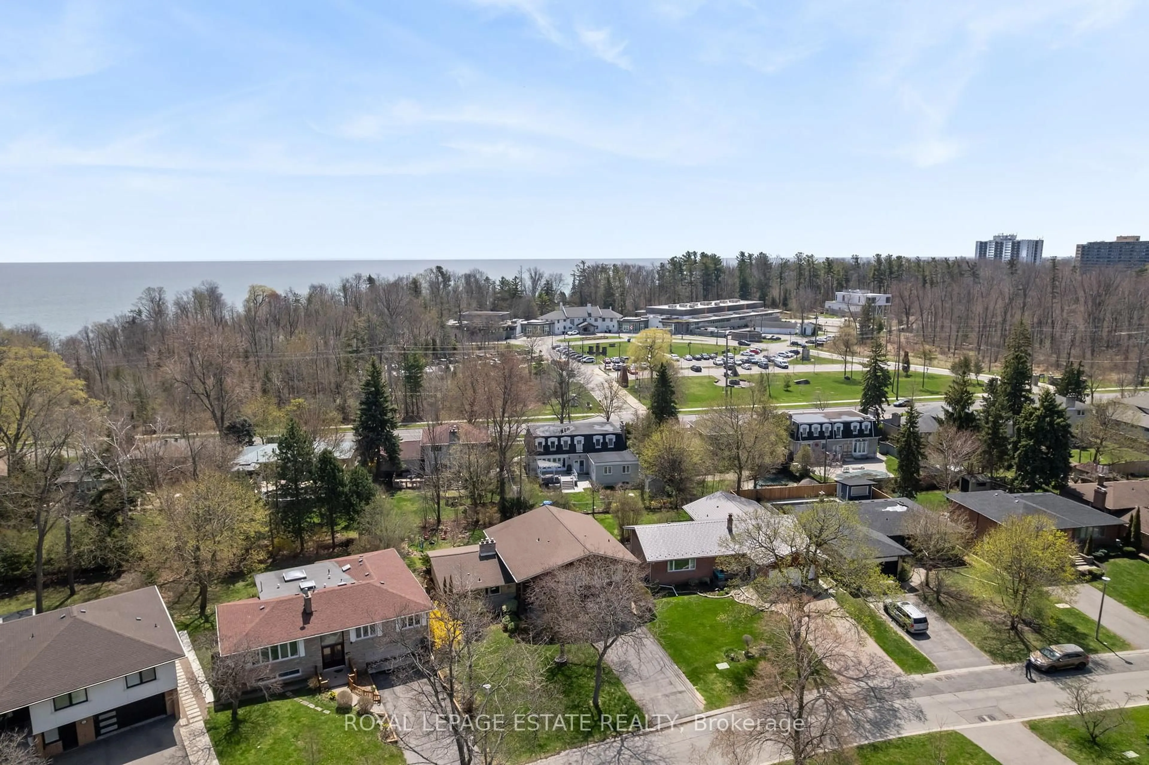 A pic from outside/outdoor area/front of a property/back of a property/a pic from drone, water/lake/river/ocean view for 77 Toynbee Tr, Toronto Ontario M1E 1G1