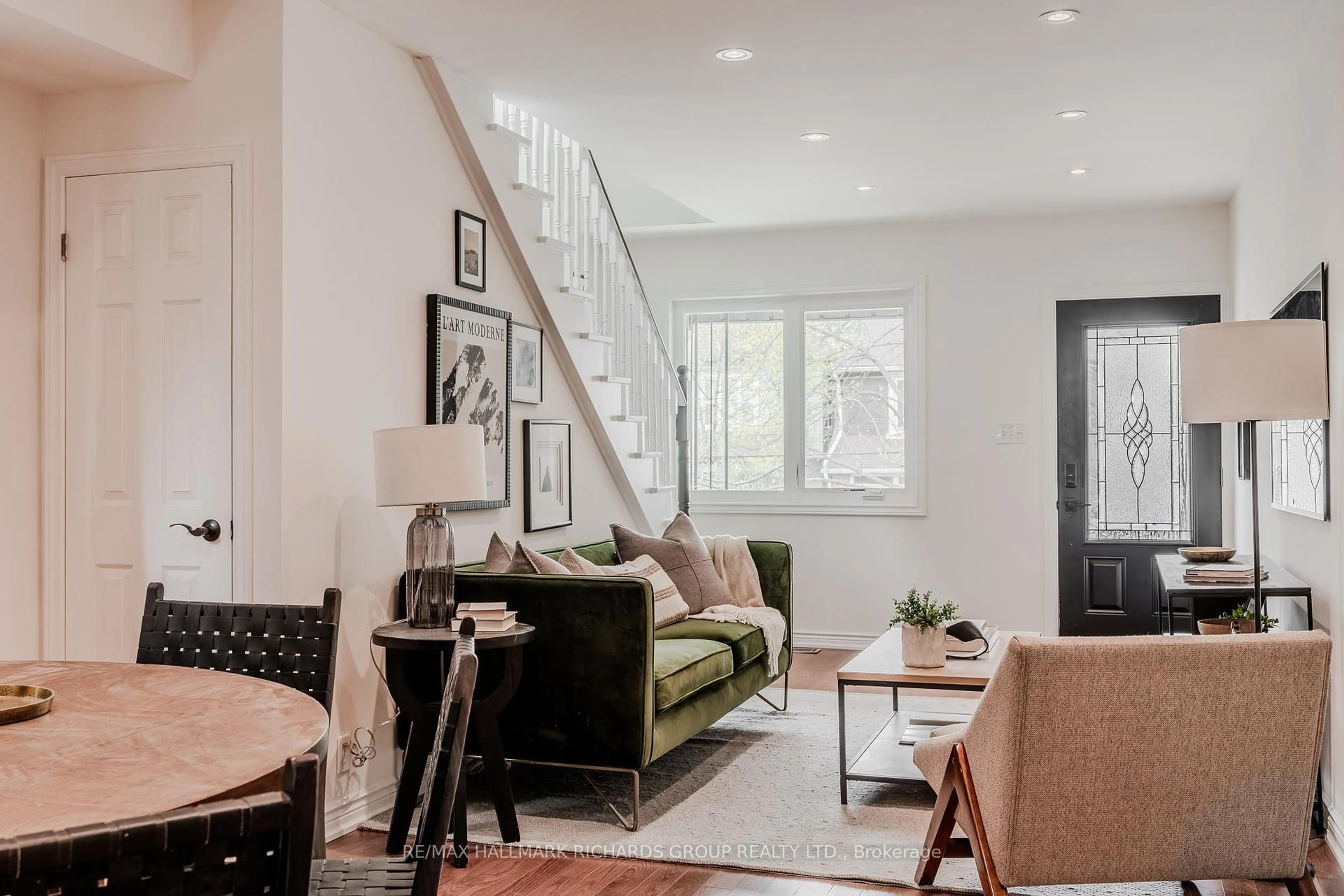 Living room with furniture, unknown for 413 Rhodes Ave, Toronto Ontario M4L 3A6