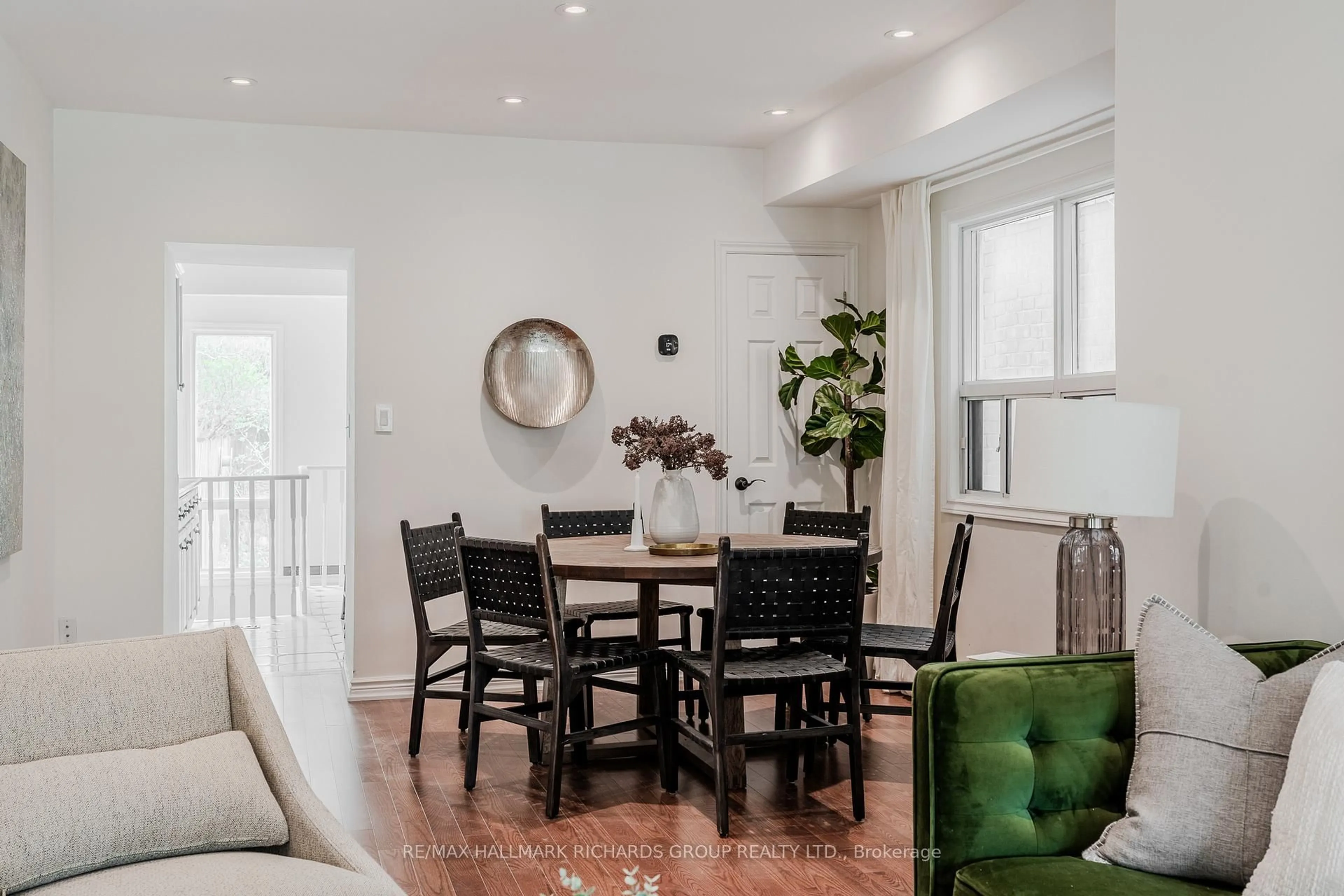Dining room, wood/laminate floor for 413 Rhodes Ave, Toronto Ontario M4L 3A6