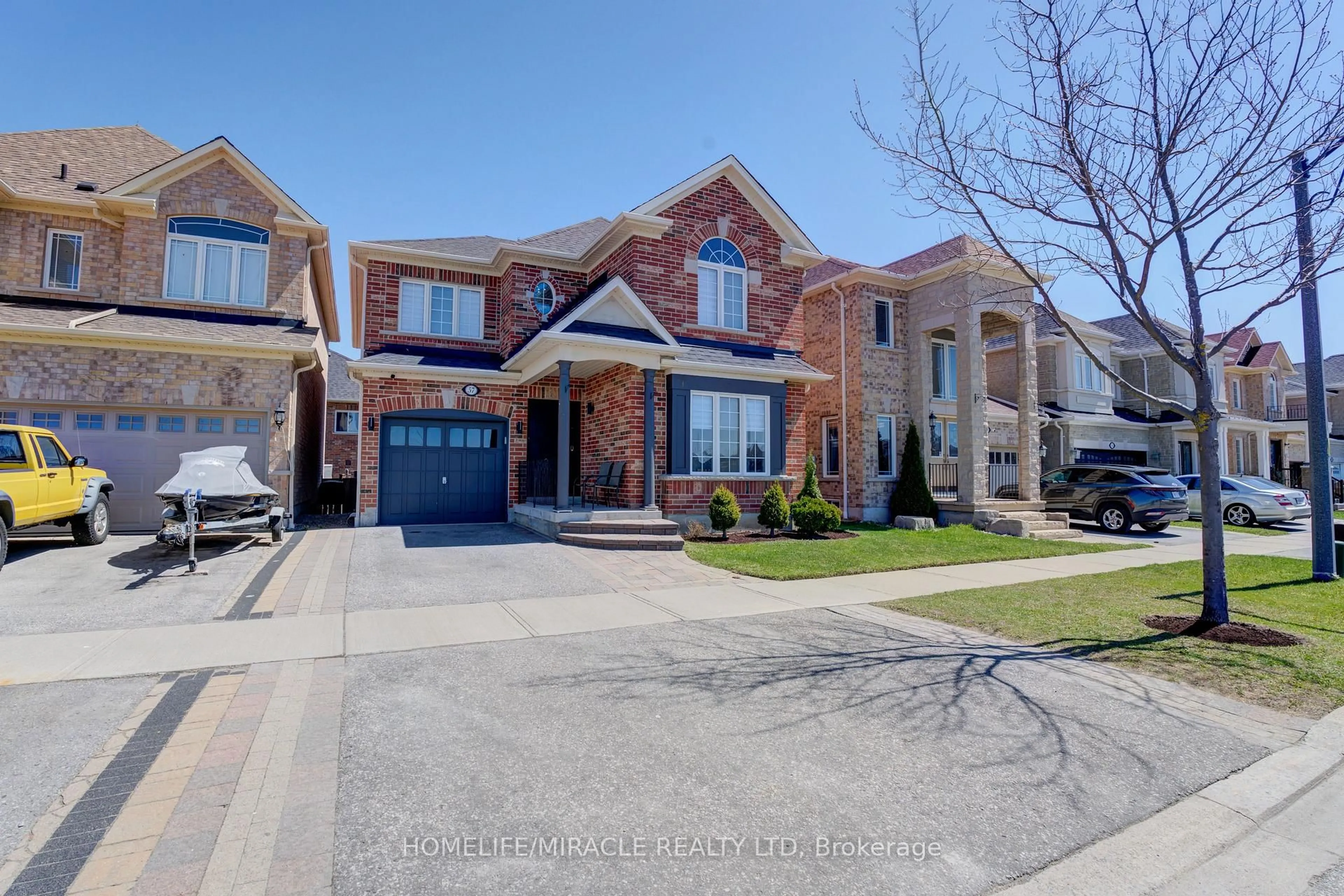 Home with brick exterior material, street for 57 Hollier Dr, Ajax Ontario L1Z 2A4