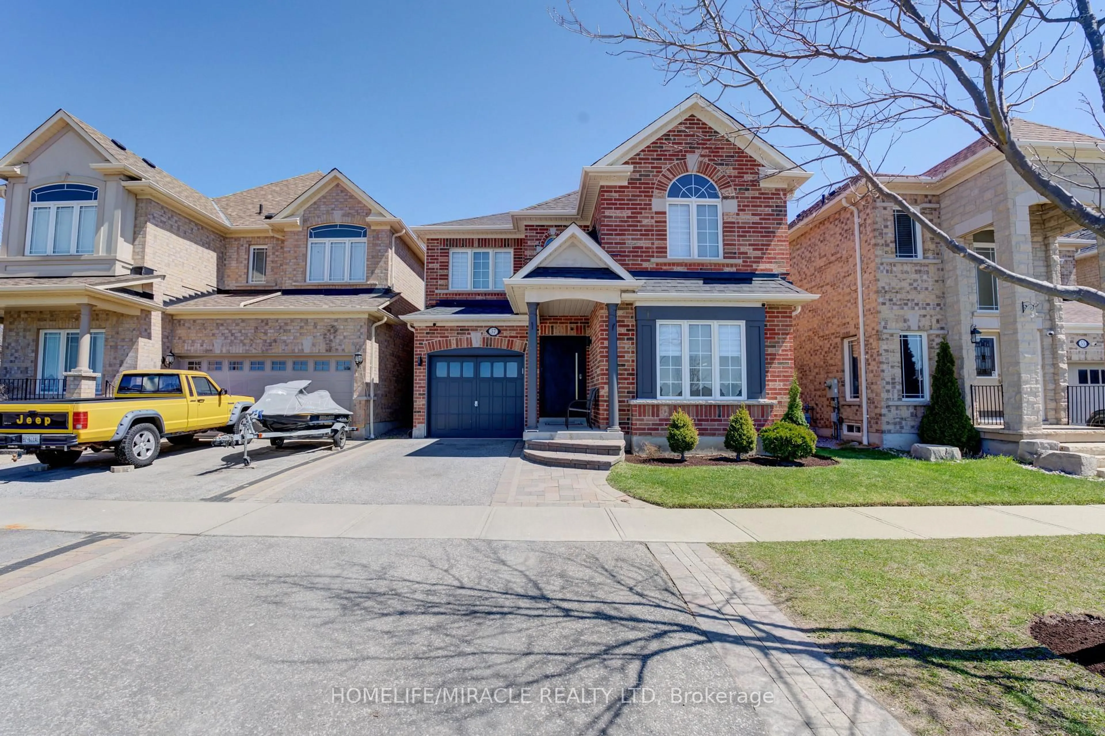 Home with brick exterior material, street for 57 Hollier Dr, Ajax Ontario L1Z 2A4