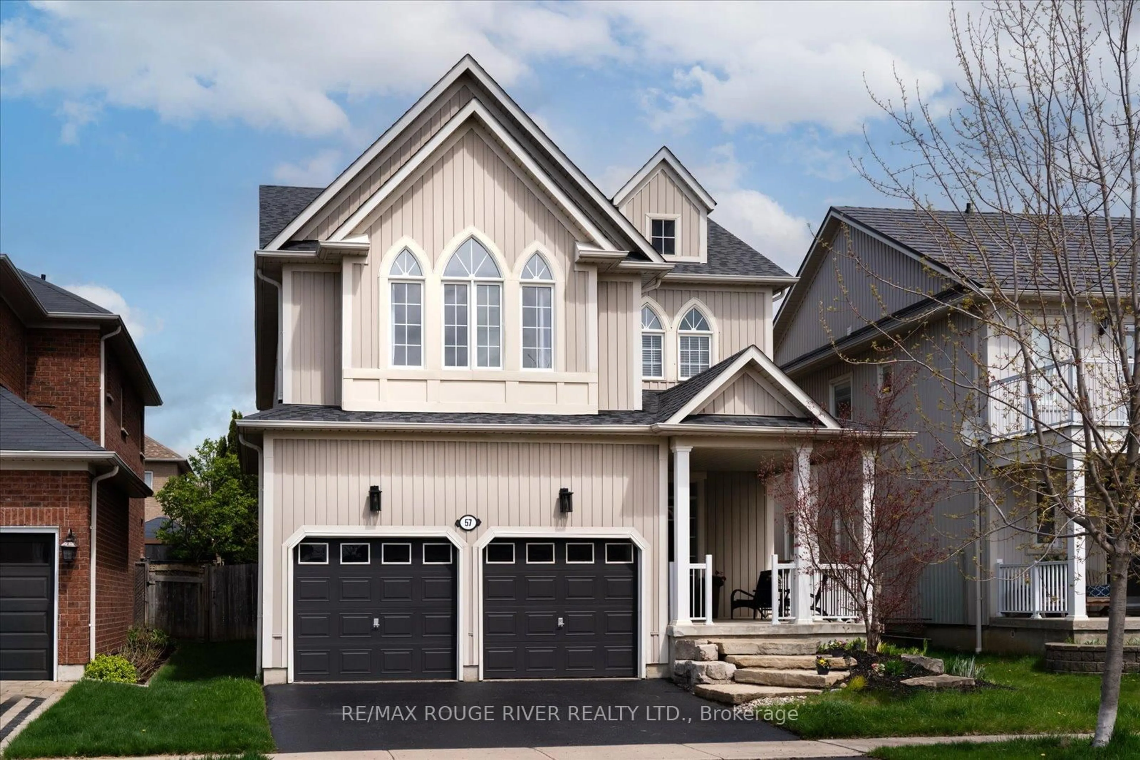 Home with vinyl exterior material, street for 57 Penhurst Dr, Whitby Ontario L1M 2E1