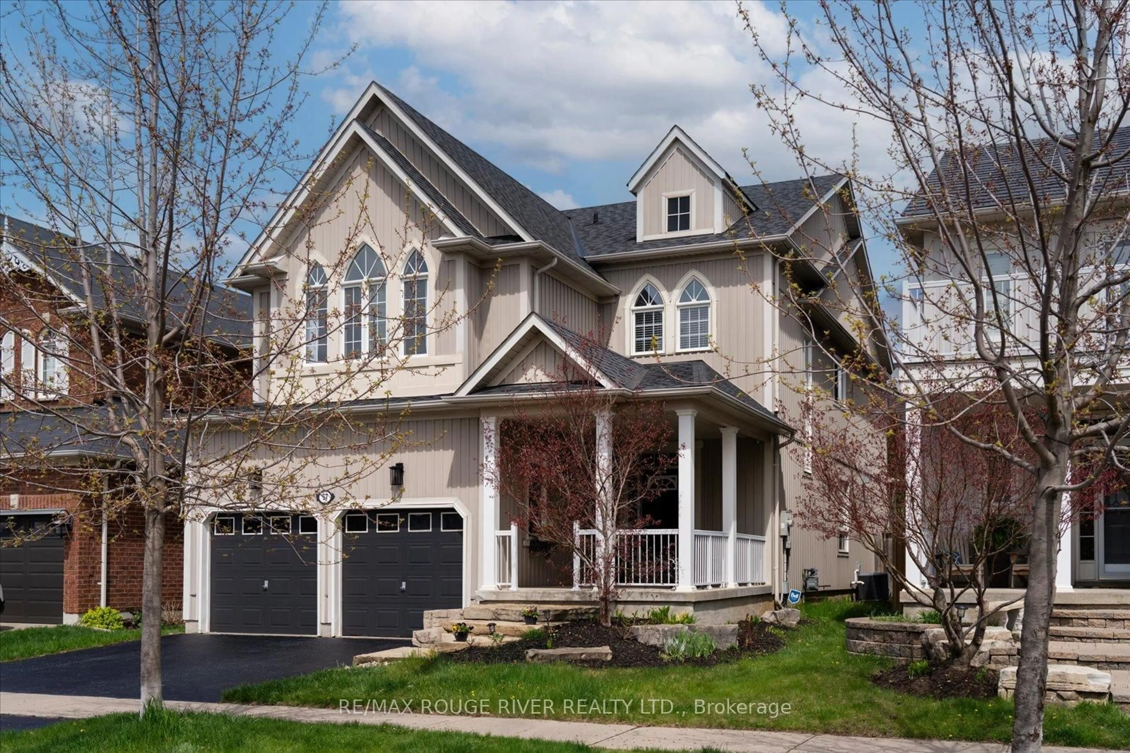 Home with vinyl exterior material, street for 57 Penhurst Dr, Whitby Ontario L1M 2E1