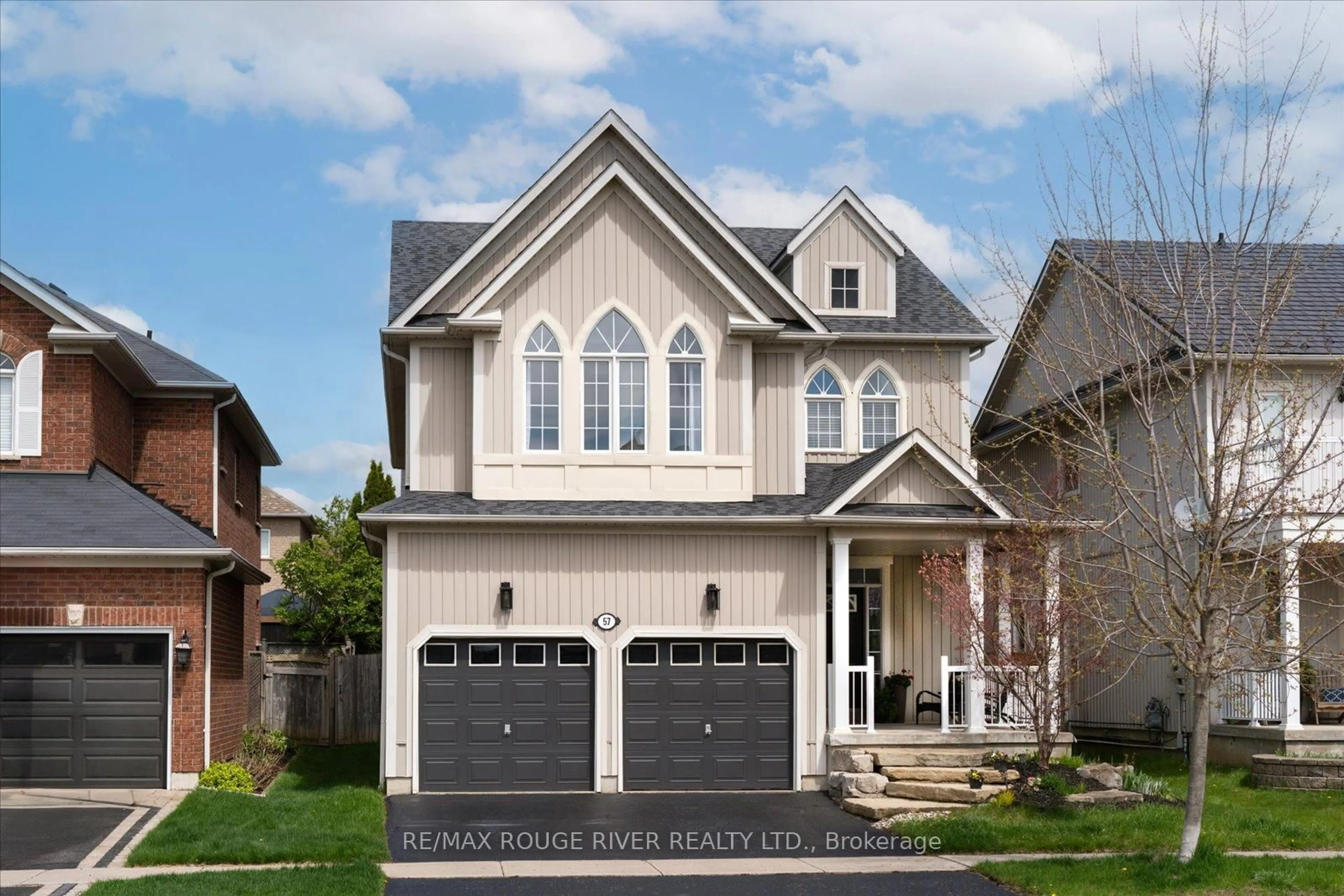 Home with vinyl exterior material, street for 57 Penhurst Dr, Whitby Ontario L1M 2E1