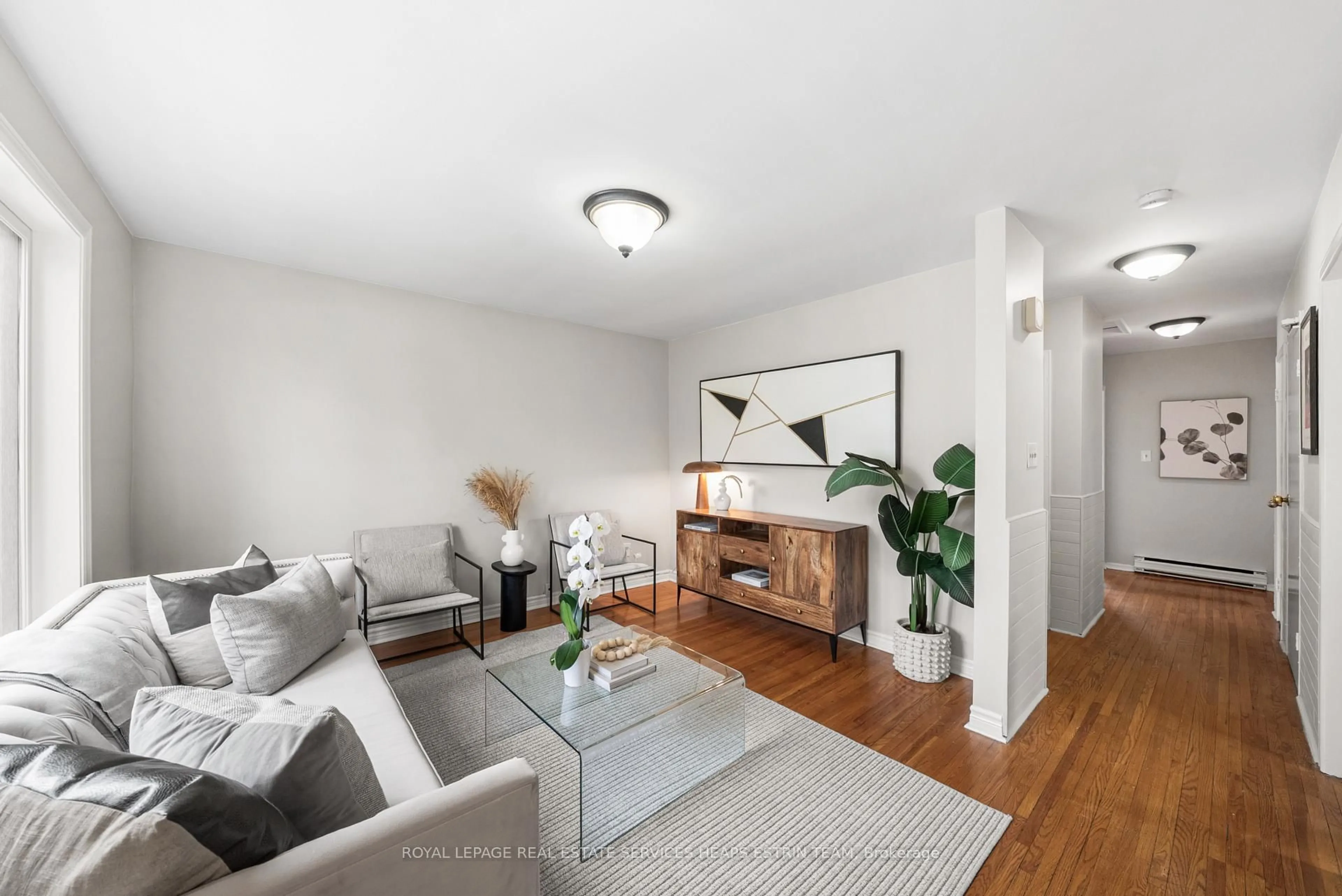 Living room with furniture, wood/laminate floor for 7 Kecala Rd, Toronto Ontario M1P 1K5