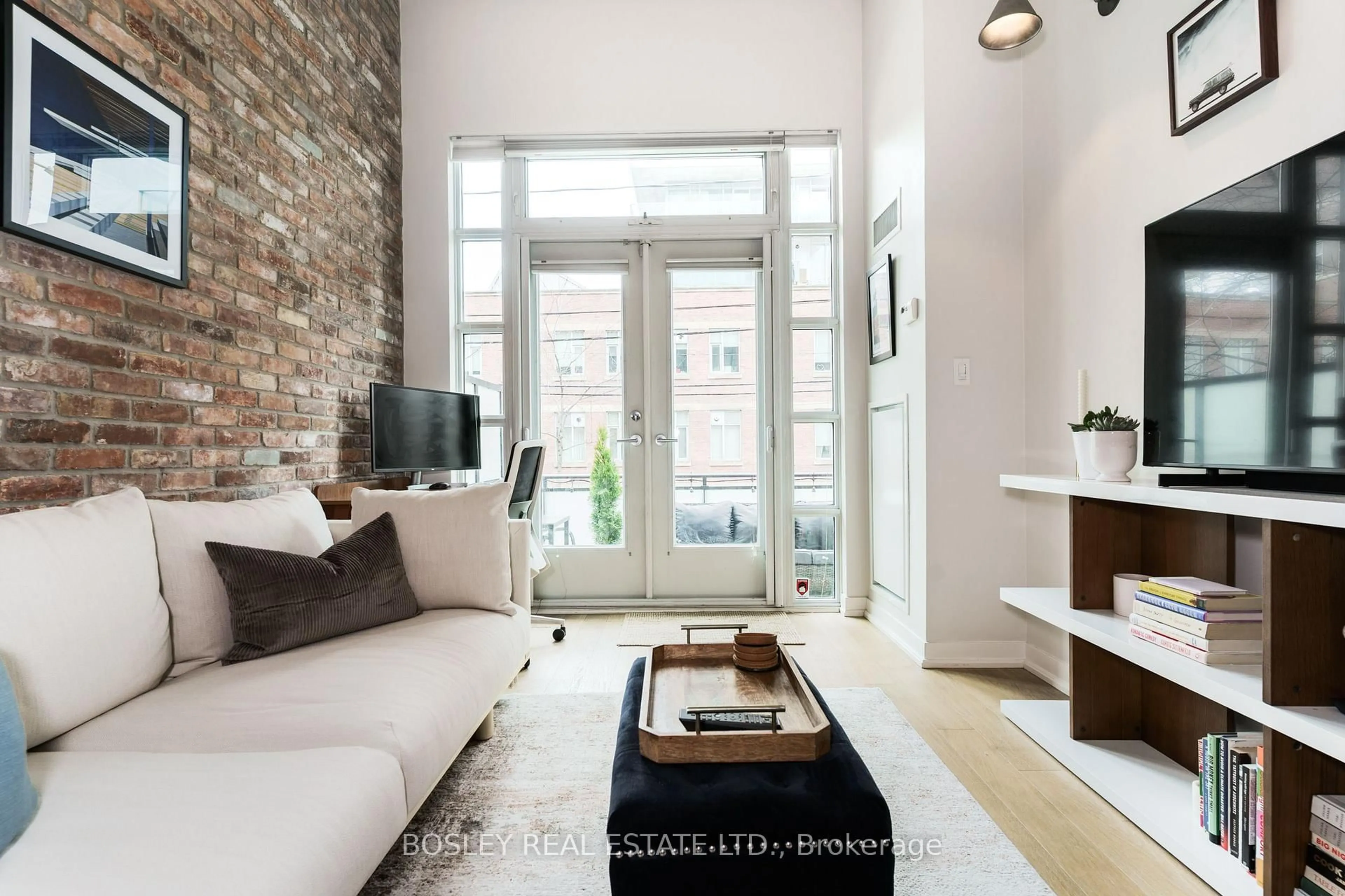 Living room with furniture, unknown for 88 Colgate Ave #115, Toronto Ontario M4M 0A6