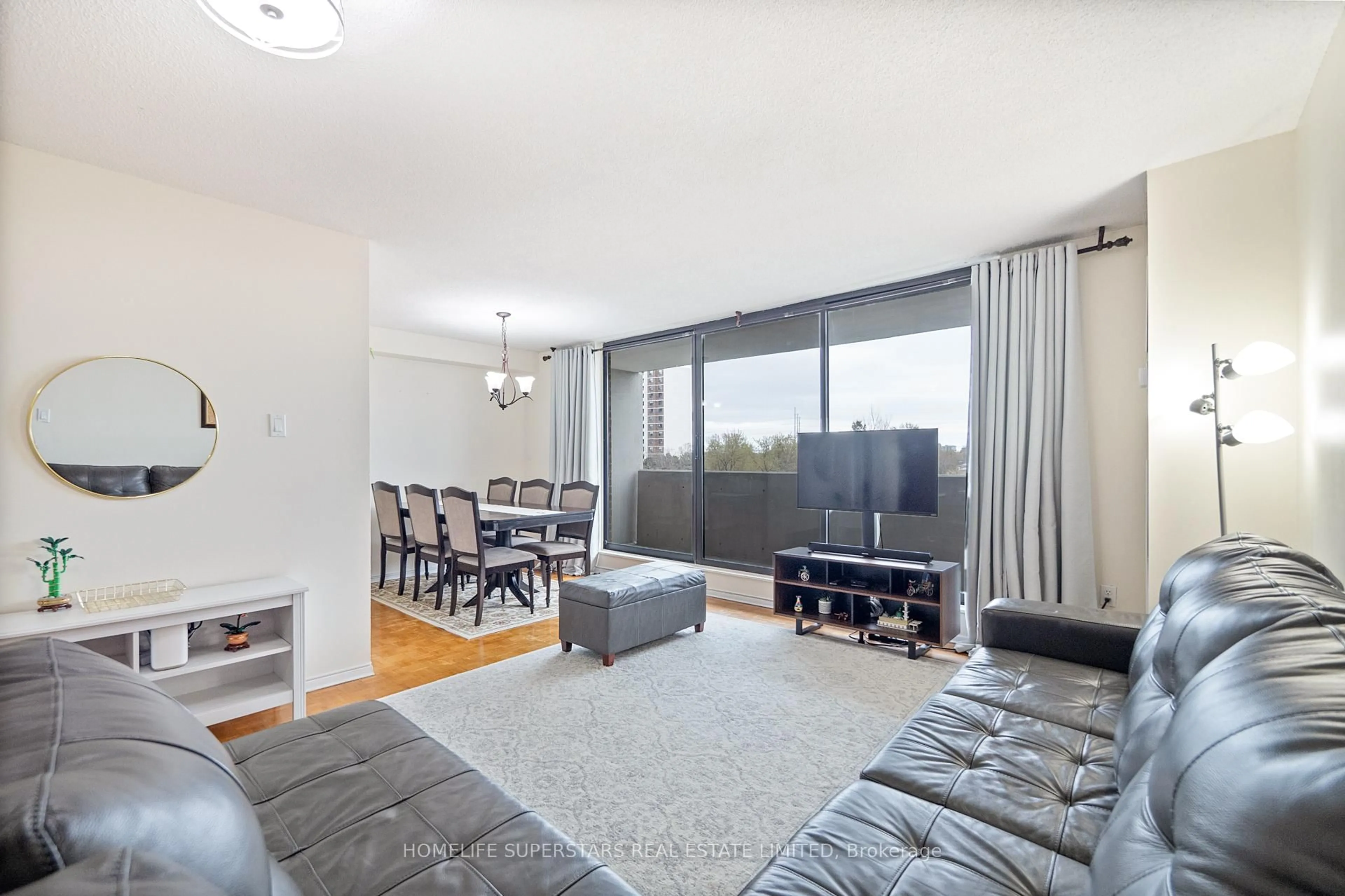 Living room with furniture, unknown for 301 Prudential Dr #409, Toronto Ontario M1P 4V3