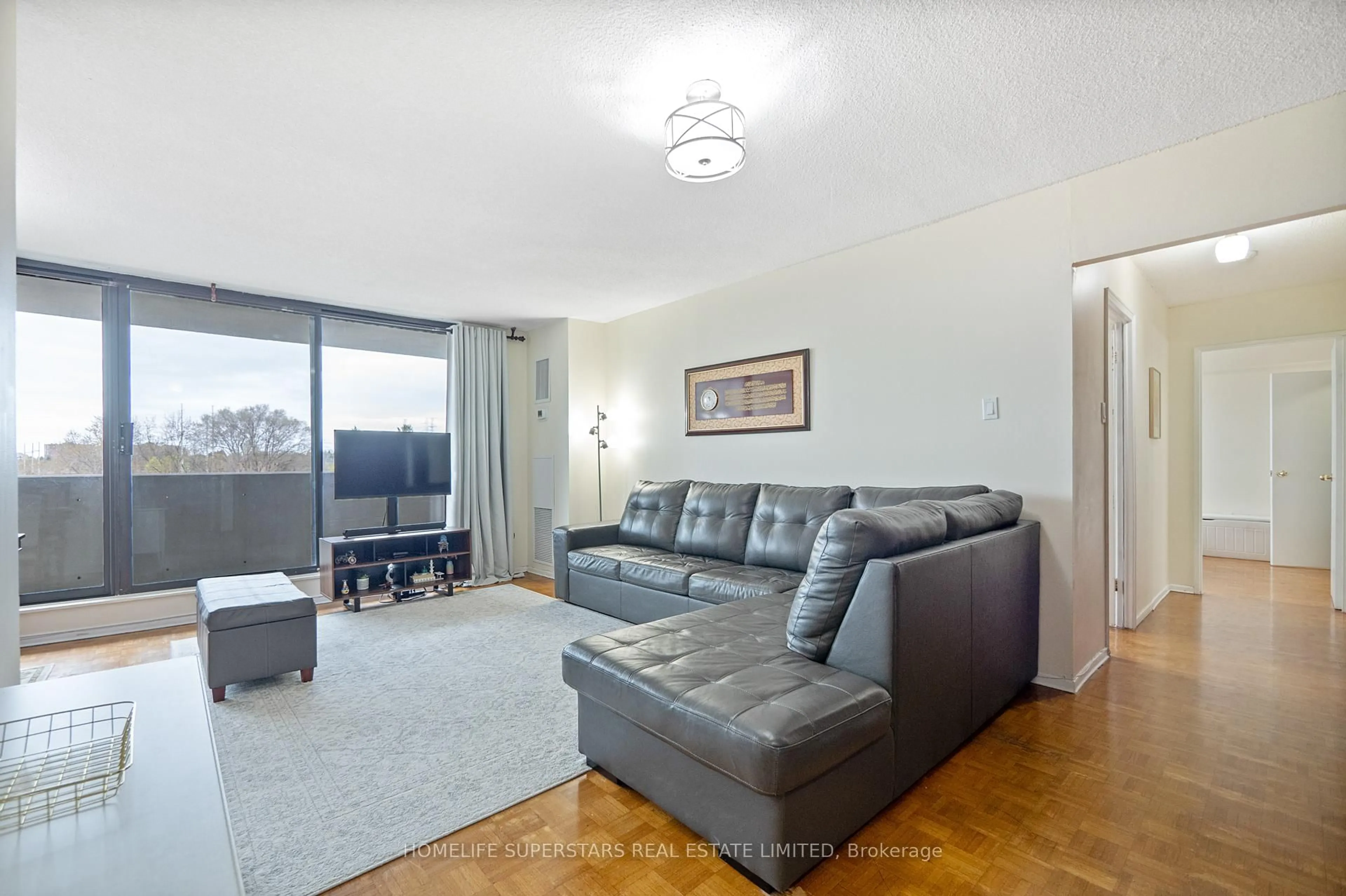 Living room with furniture, unknown for 301 Prudential Dr #409, Toronto Ontario M1P 4V3