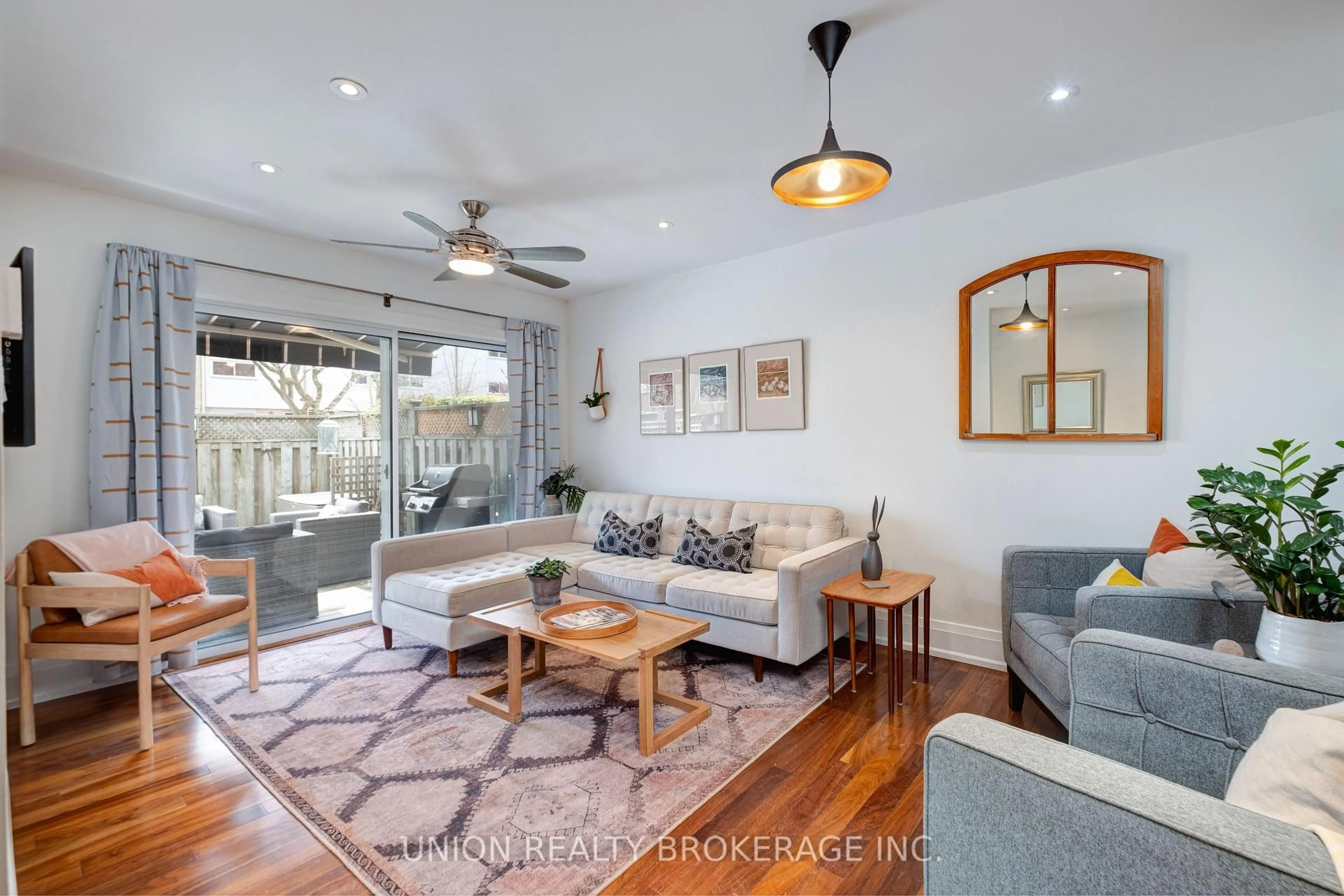 Living room with furniture, wood/laminate floor for 50 Battenberg Ave #4, Toronto Ontario M4L 1J8