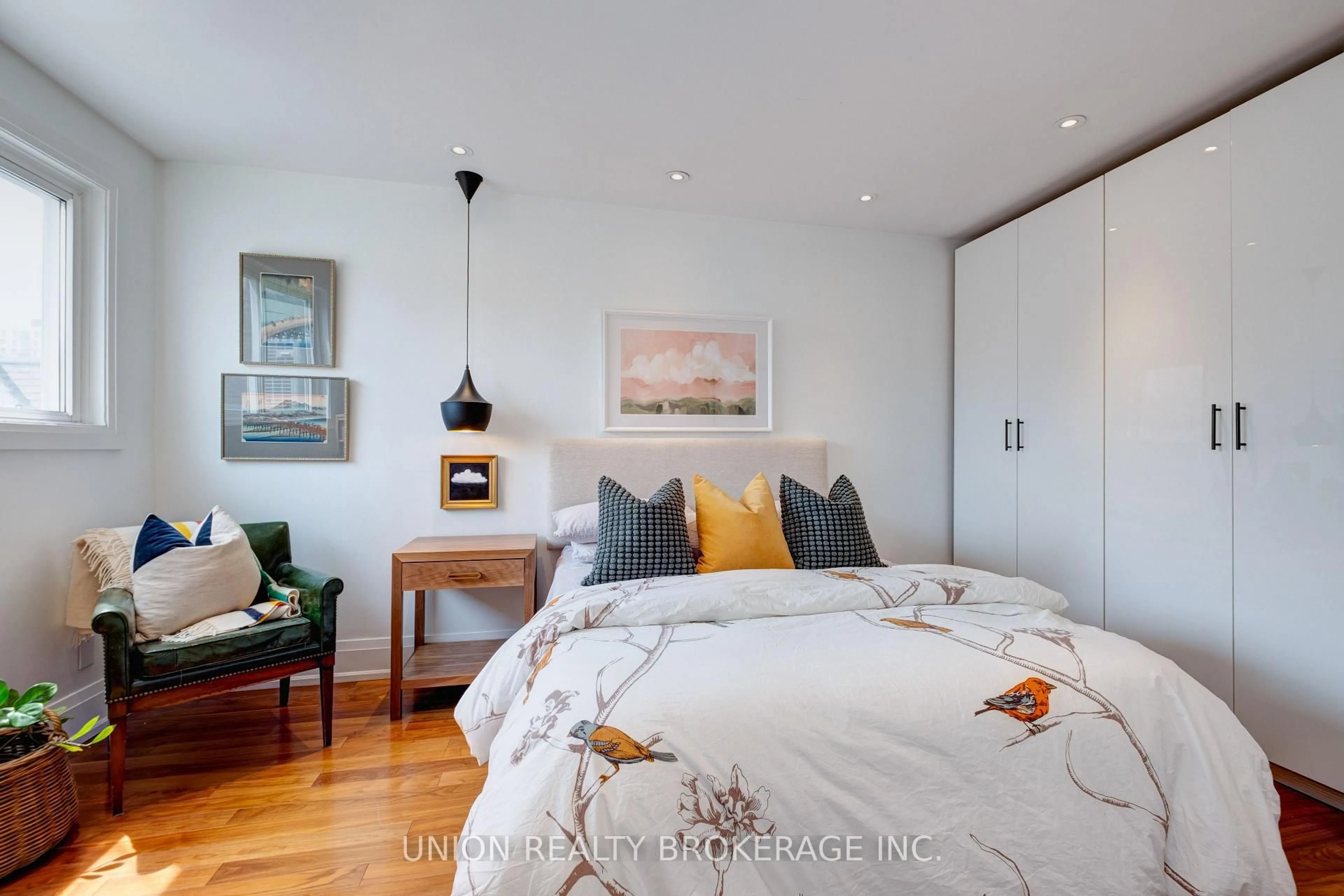 Bedroom with bed, wood/laminate floor for 50 Battenberg Ave #4, Toronto Ontario M4L 1J8