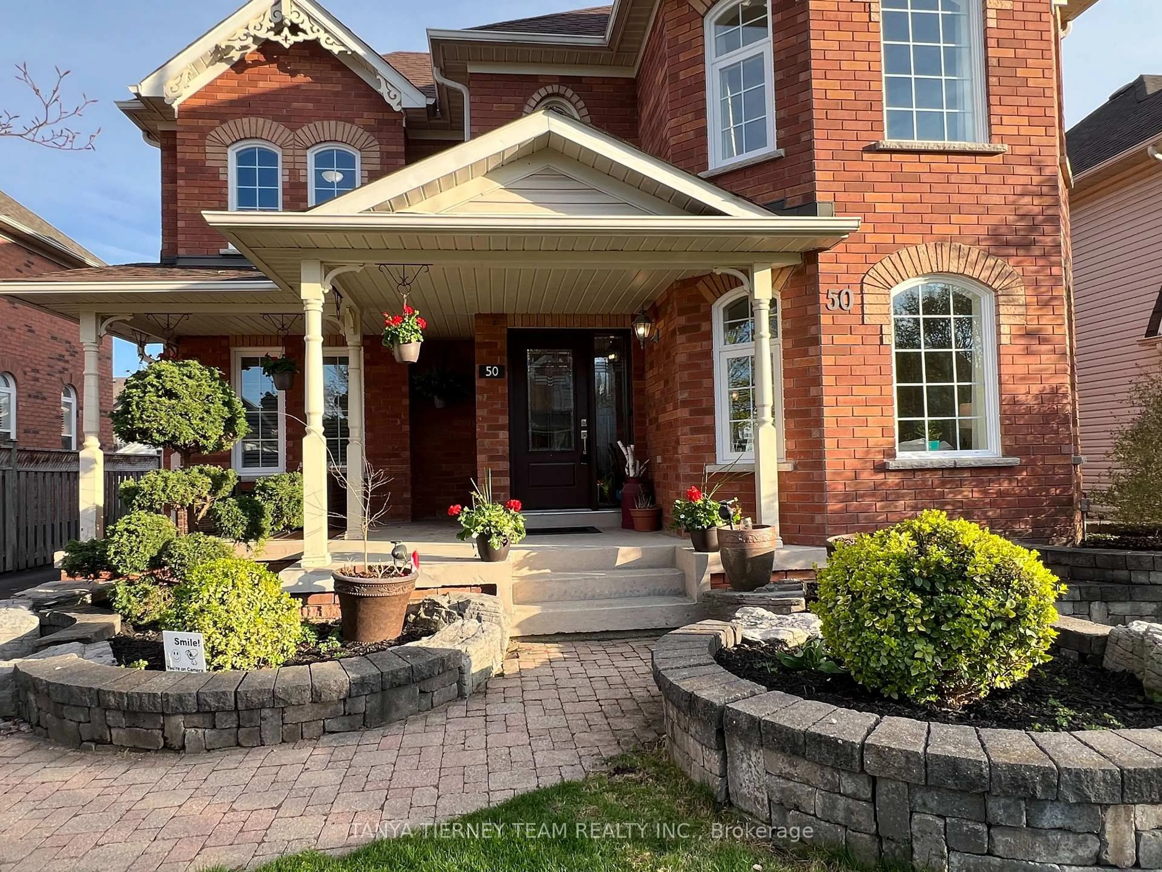 Home with brick exterior material, street for 50 McBeth Pl, Whitby Ontario L1M 1E7