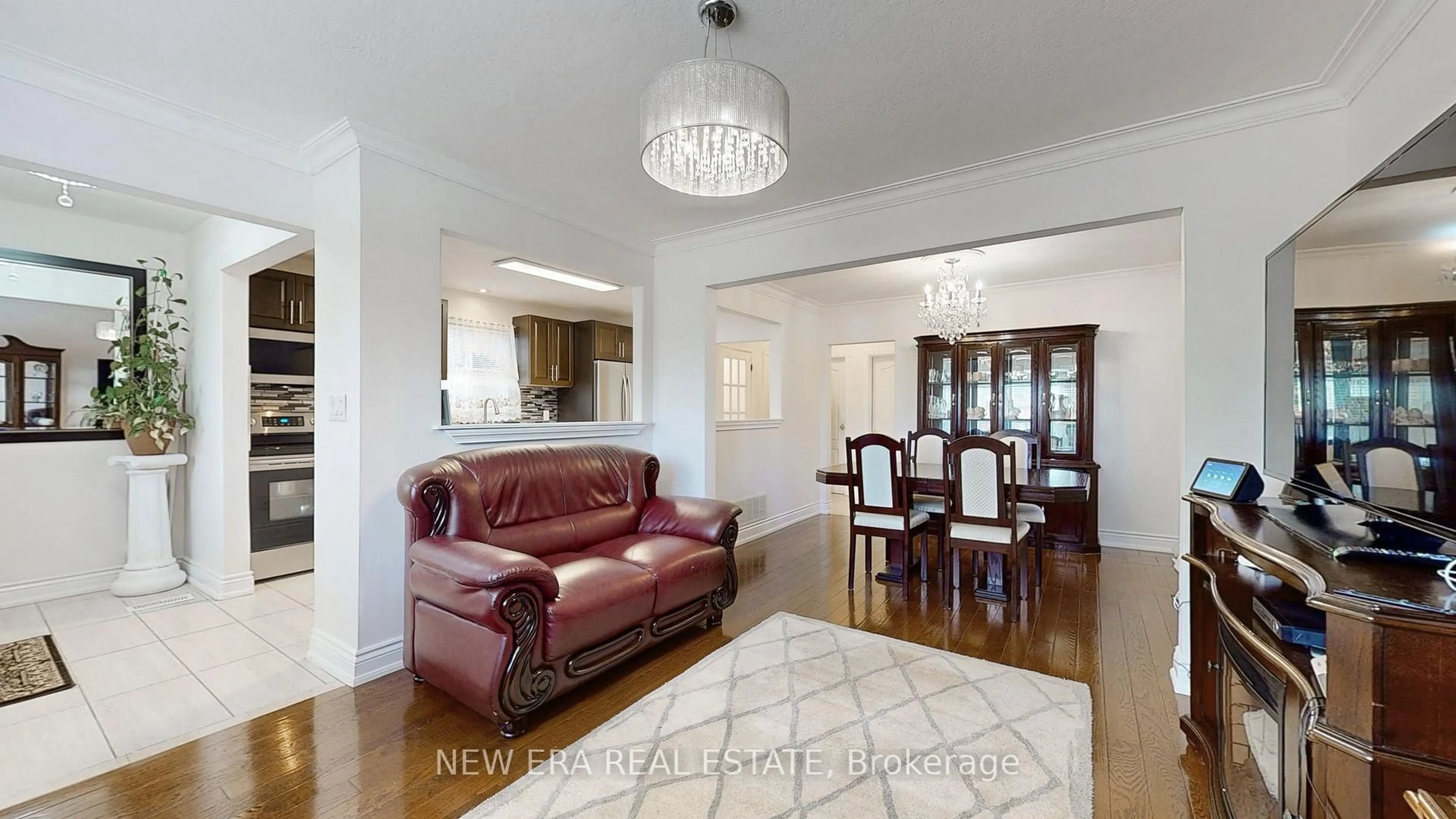Living room with furniture, wood/laminate floor for 1 Fairbourne Cres, Toronto Ontario M1L 3M6