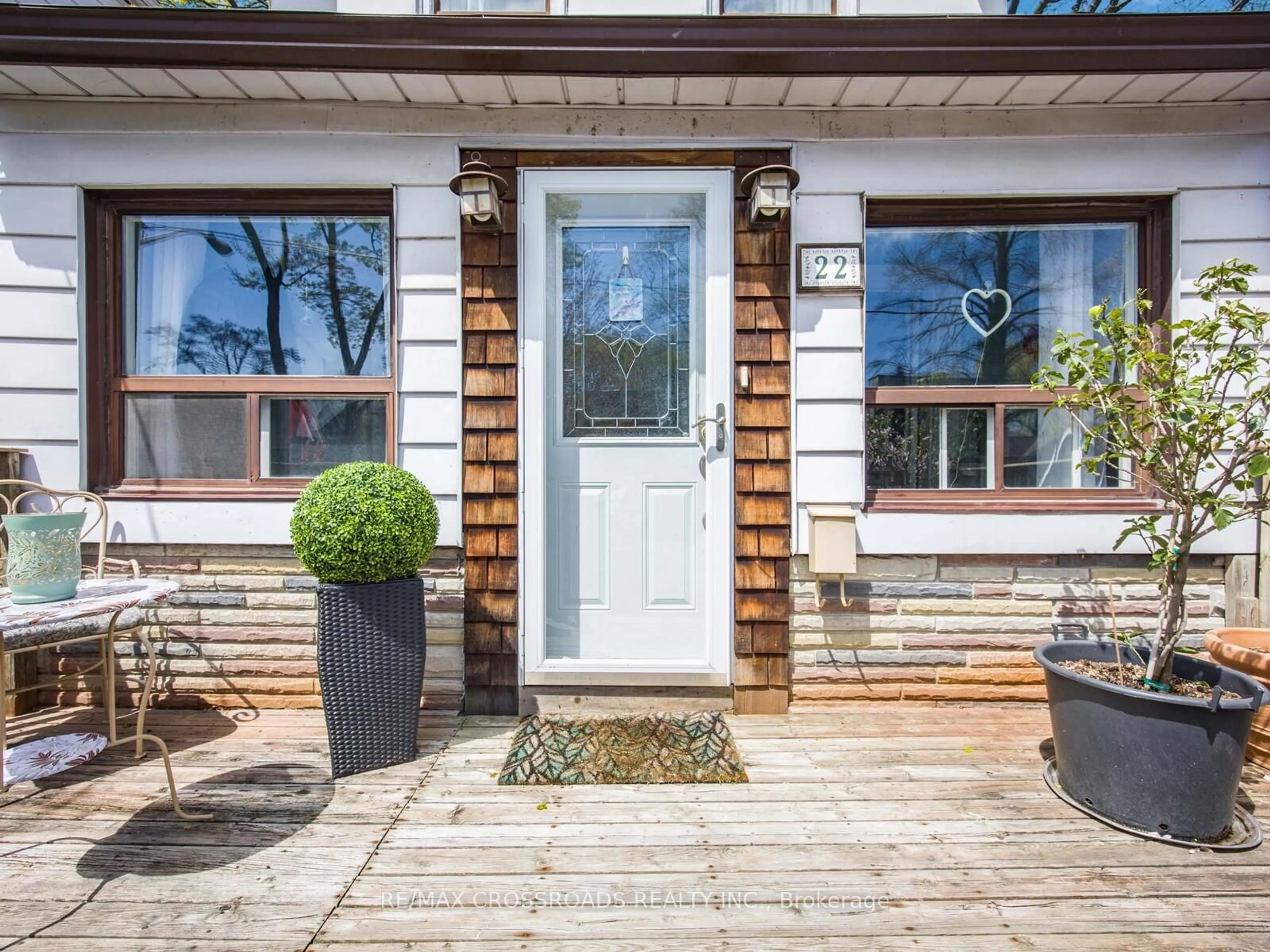 Home with brick exterior material, street for 22 Ivy Ave, Toronto Ontario M4L 2H7